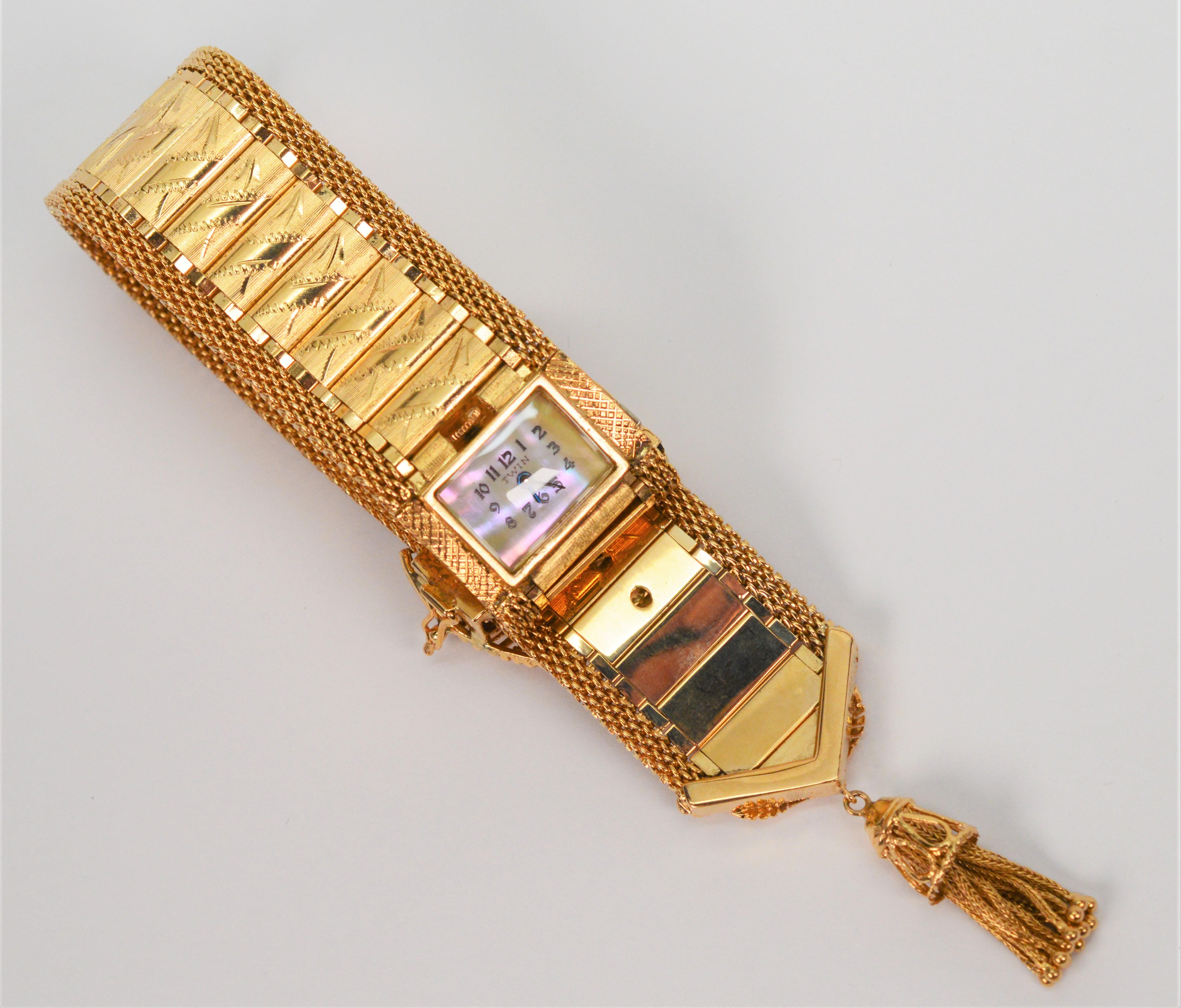 Estate 14 Karat Yellow Gold Wrap Bracelet Watch w Diamond Accents In Excellent Condition For Sale In Mount Kisco, NY