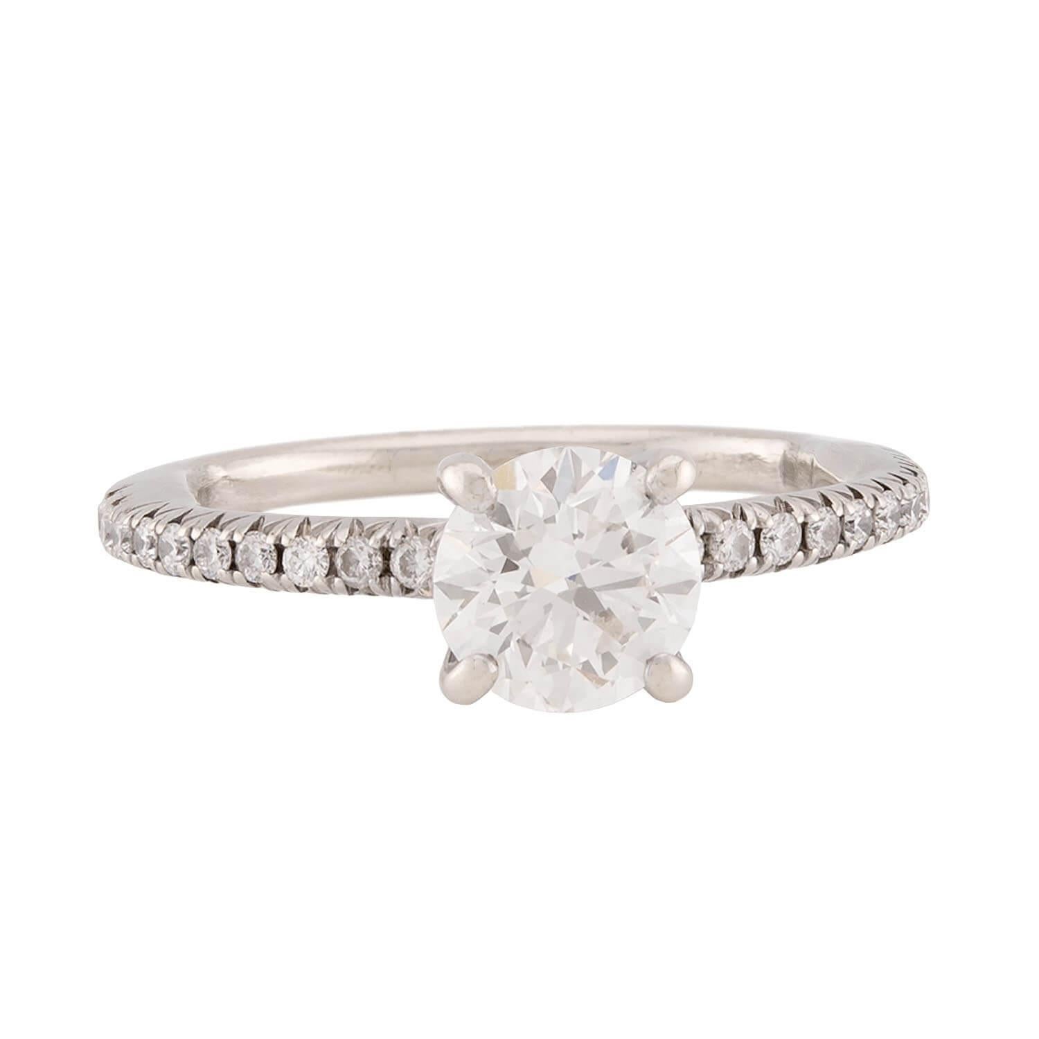 A classically beautiful diamond engagement ring! Crafted in 14k white gold, this ring features a wonderful 0.96ct modern round brilliant cut diamond, which is held within a four-prong setting. The stunning ring display H color and SI1 clarity. The