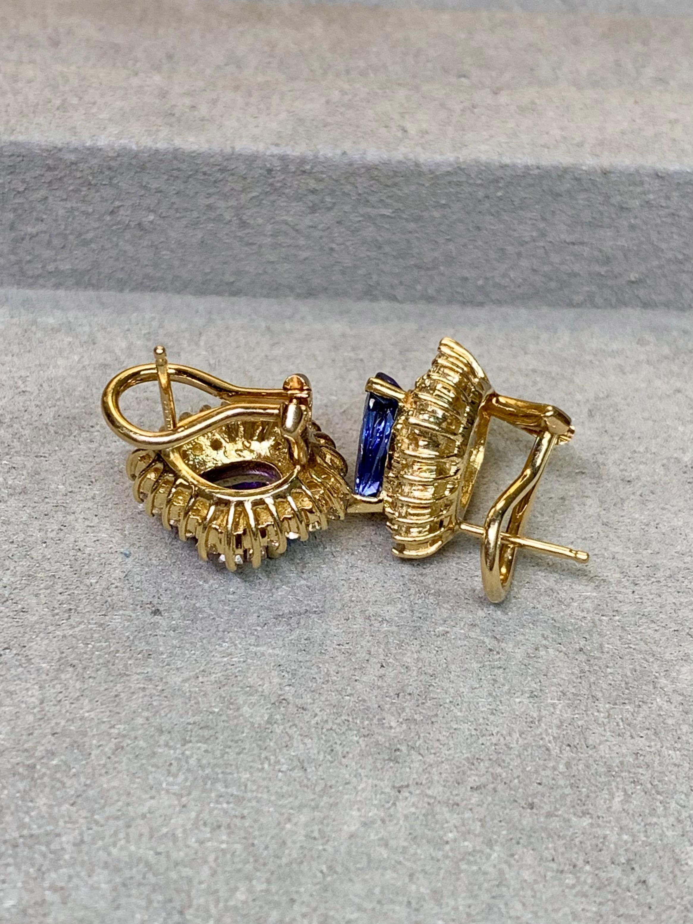 Estate 14K Pear Tanzanite Baguette Diamond Omega Back Huggie Earrings 5ctw In Good Condition For Sale In Winter Springs, FL