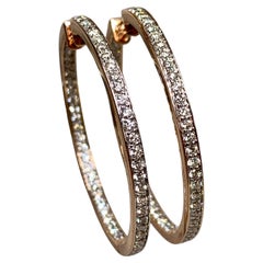 Pendientes de aro de oro rosa de 14 quilates con diamantes en el interior y el exterior