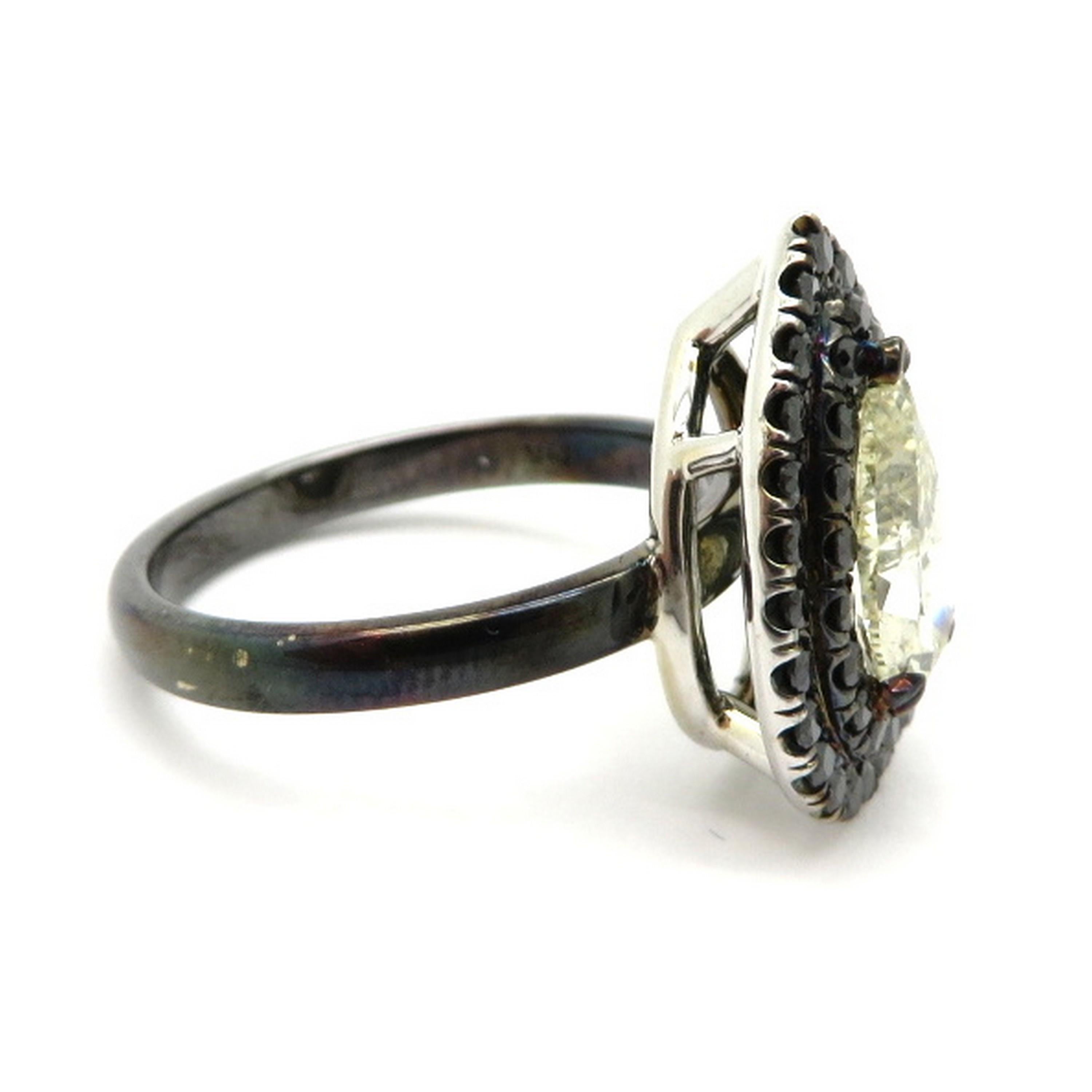 pear shaped black diamond engagement ring