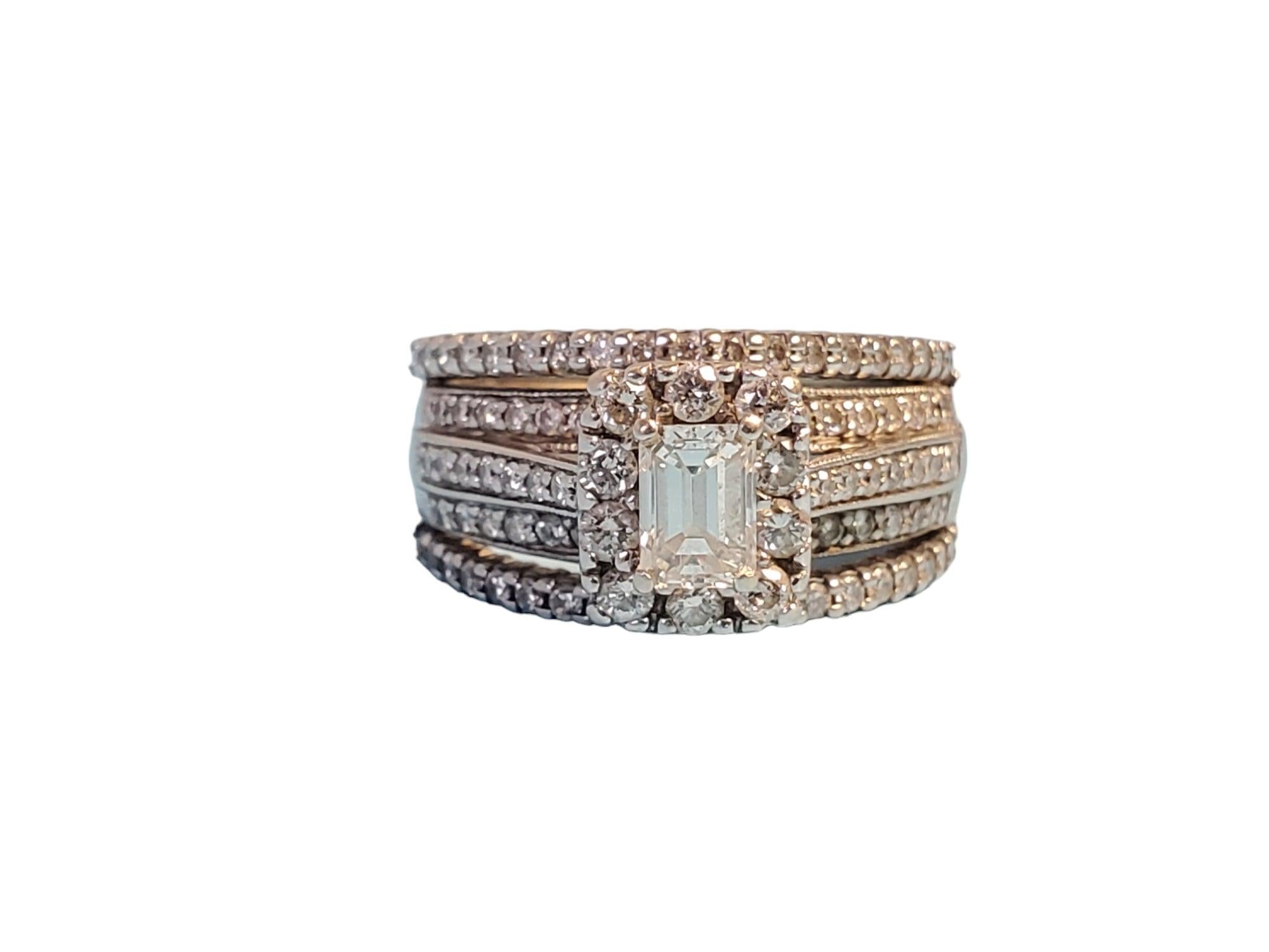 Estate 14k white gold diamond ring with 1tcw white GH VS-SI round brilliant diamonds and .33ct emerald cut center stone. This diamond ring is a size 6. Would make a great engagement, wedding ring or right hand diamond ring. weight is 6.4g