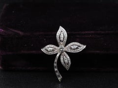 Broche fleur en or blanc 14 carats avec diamants