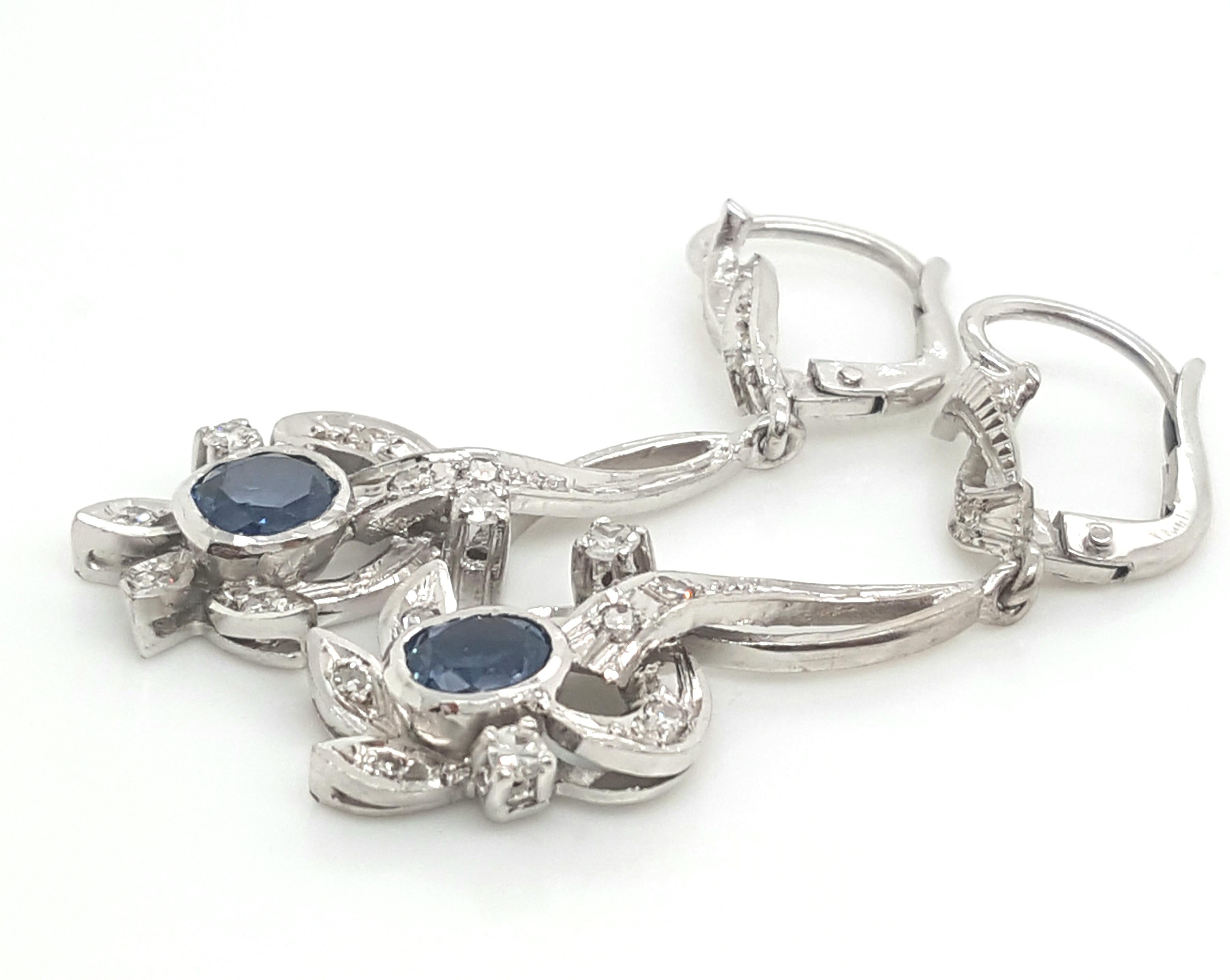 Round Cut Estate 14 Karat White Gold Oval Blue Sapphire and Diamond Leverback Earrings For Sale