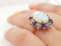 Estate 14 Karat Yellow and White Gold Opal Sapphire and Diamond Cocktail Ring