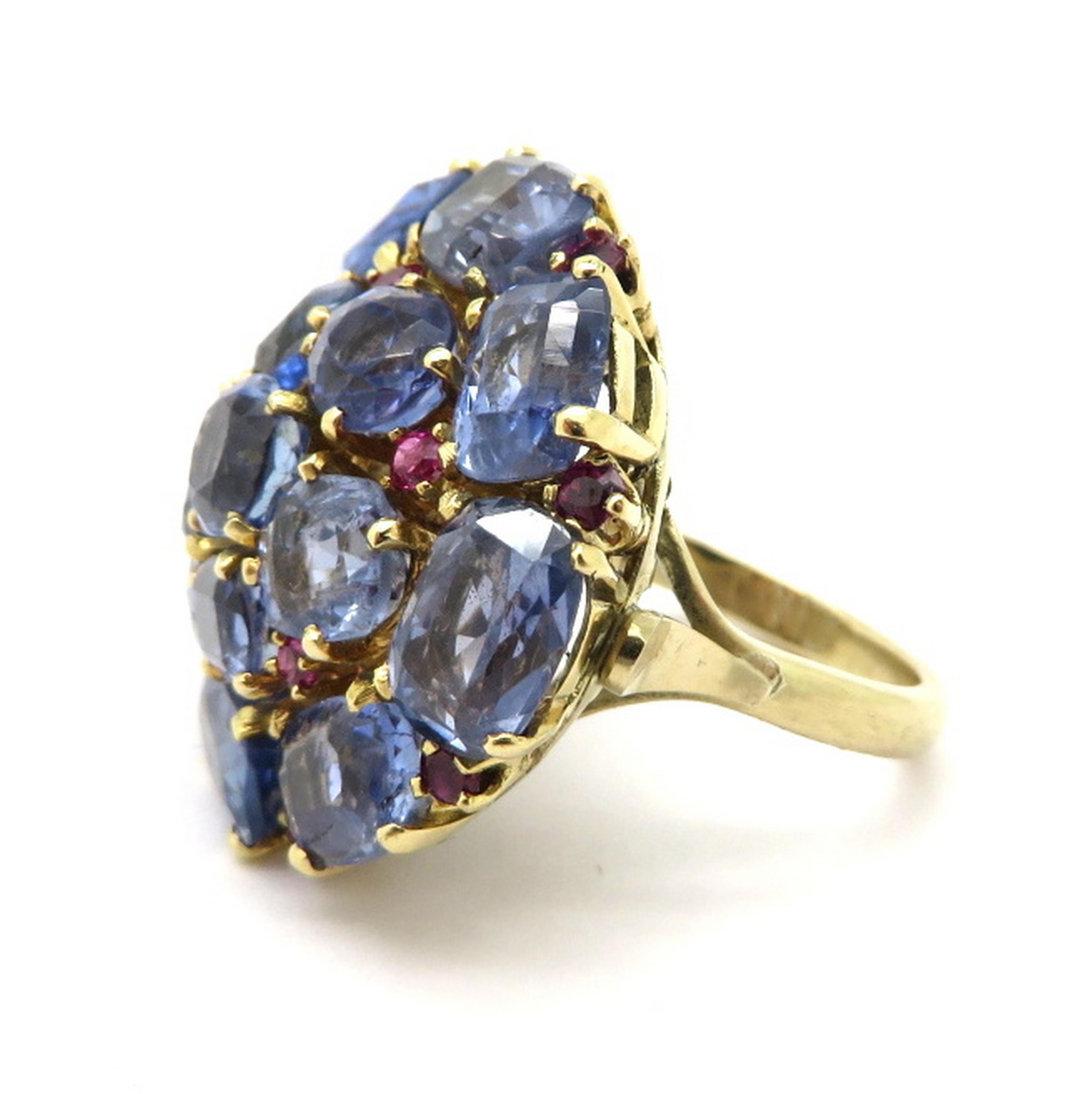 Estate 14K yellow gold 20.00 carat GIA certified sapphire and ruby cluster fashion ring. Showcasing 14 fine quality GIA certified sapphires with no heat treatment, and 13 round brilliant cut fine quality ruby accents. The GIA colored stone report is