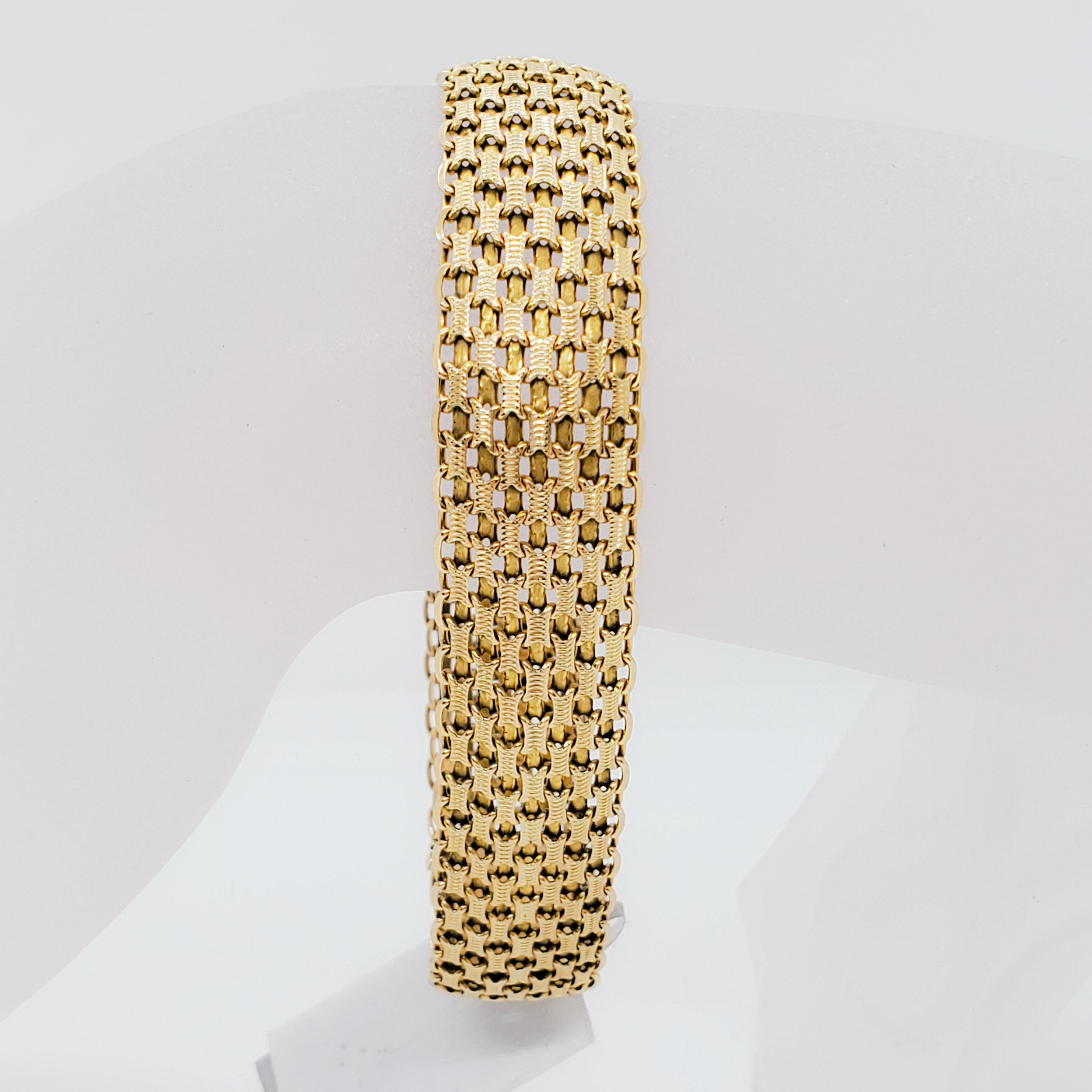 Beautiful estate yellow gold bracelet in 14k.  The design is so pretty and handmade.  Perfect for stacking or wearing on it's own.  Mint condition.  Length is 8.25