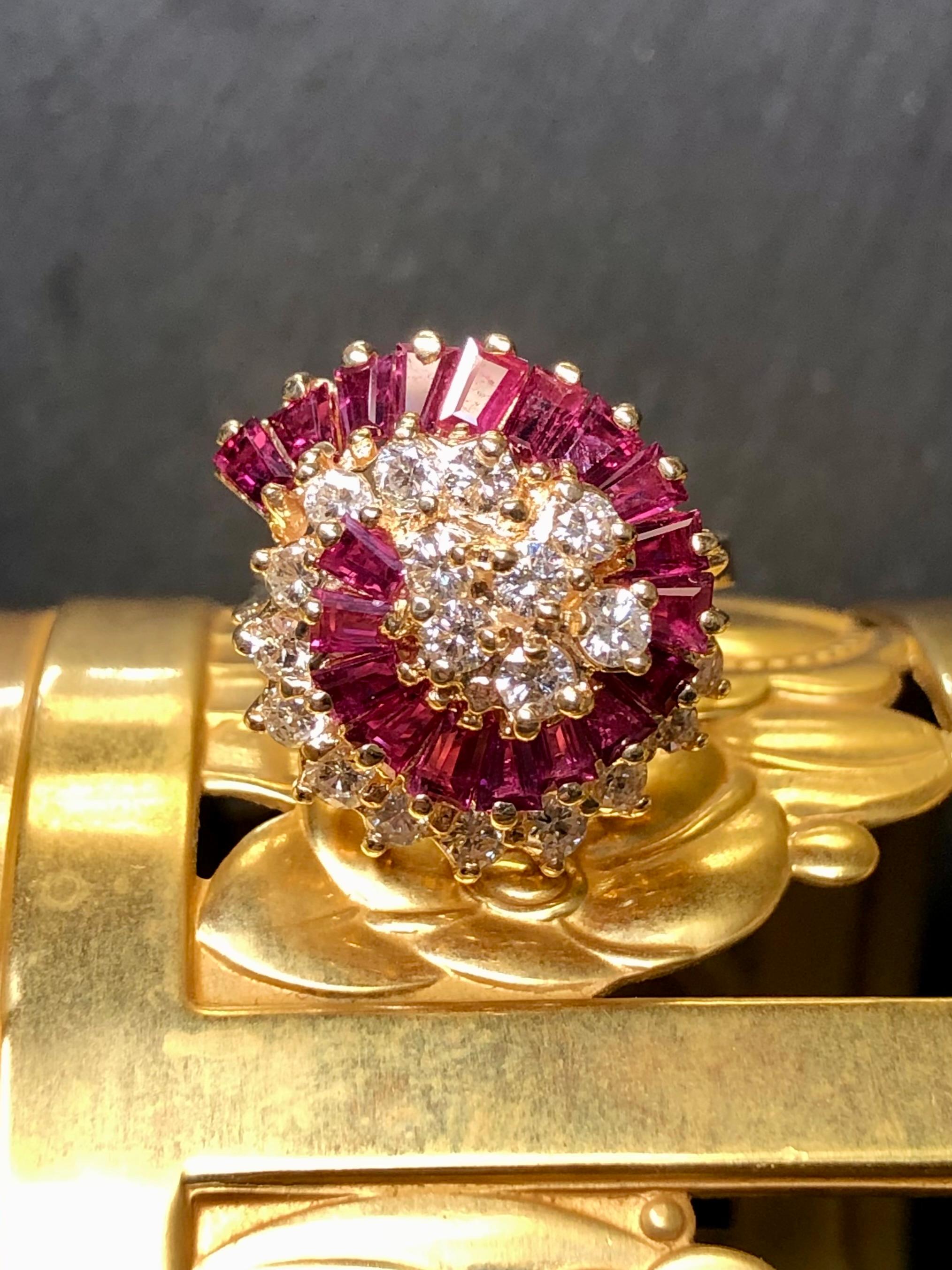 A gorgeous cocktail ring done in 14K yellow gold prong set with approximately 1.33cttw in F-G color Vs1 clarity round diamonds as well as 2.28cttw in gorgeously vibrant red natural tapered baguette rubies.


Dimensions/Weight:

Ring measures .75” in