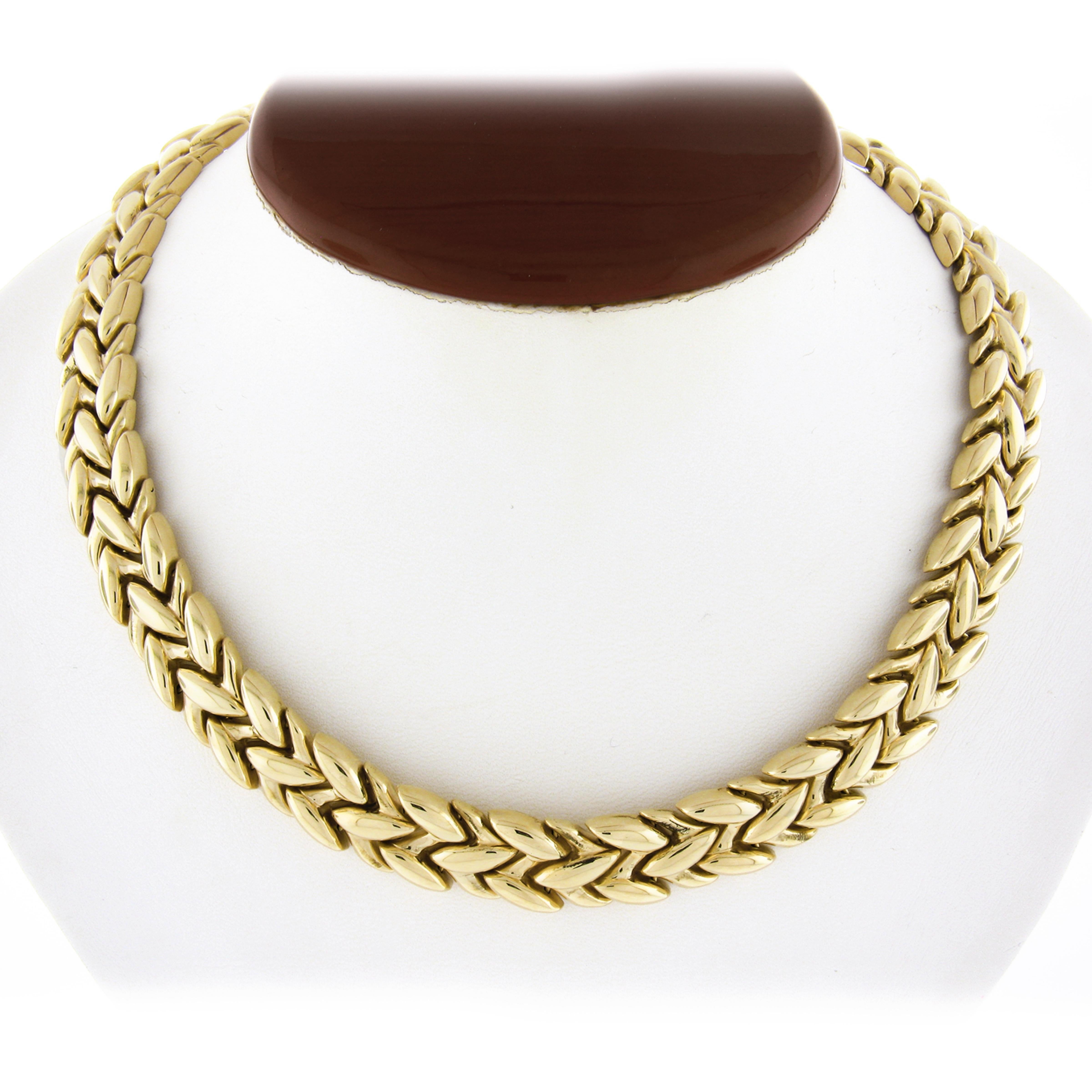 This beautiful Italian substantial chain necklace is crafted from solid 14k yellow. It features olive leaf link style with high-polished finish. This heavy solidly made necklace is 15.5 inches in length, giving you the option to wear it alone as