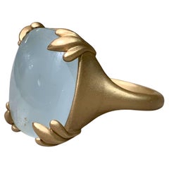 Bague cocktail en or jaune 14K satiné avec aigue-marine en cabochon coussin