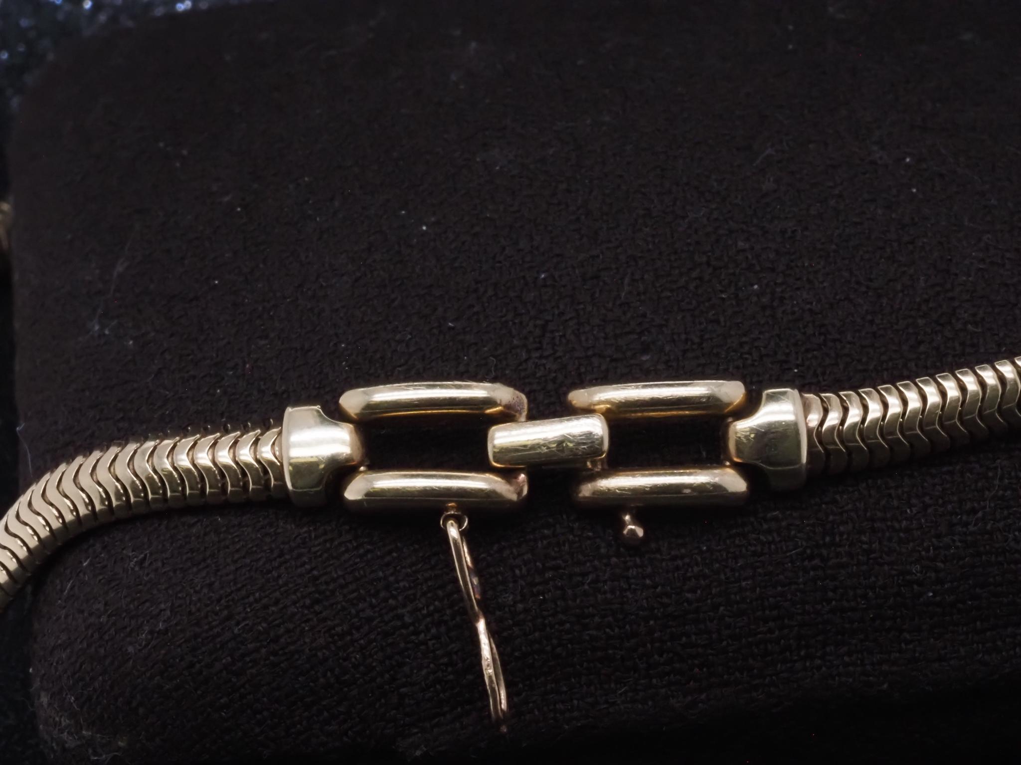 Estate 14K Yellow Gold TIFFANY & CO. Snake Chain Necklace - VHK#451B

Item Details:
Year: 1950s
Metal Type: 14K Yellow Gold [Hallmarked, and Tested]
Weight: 40.2grams

Maker: Tiffany & Co.

Measurement: 16.5 nches
Condition: Excellent