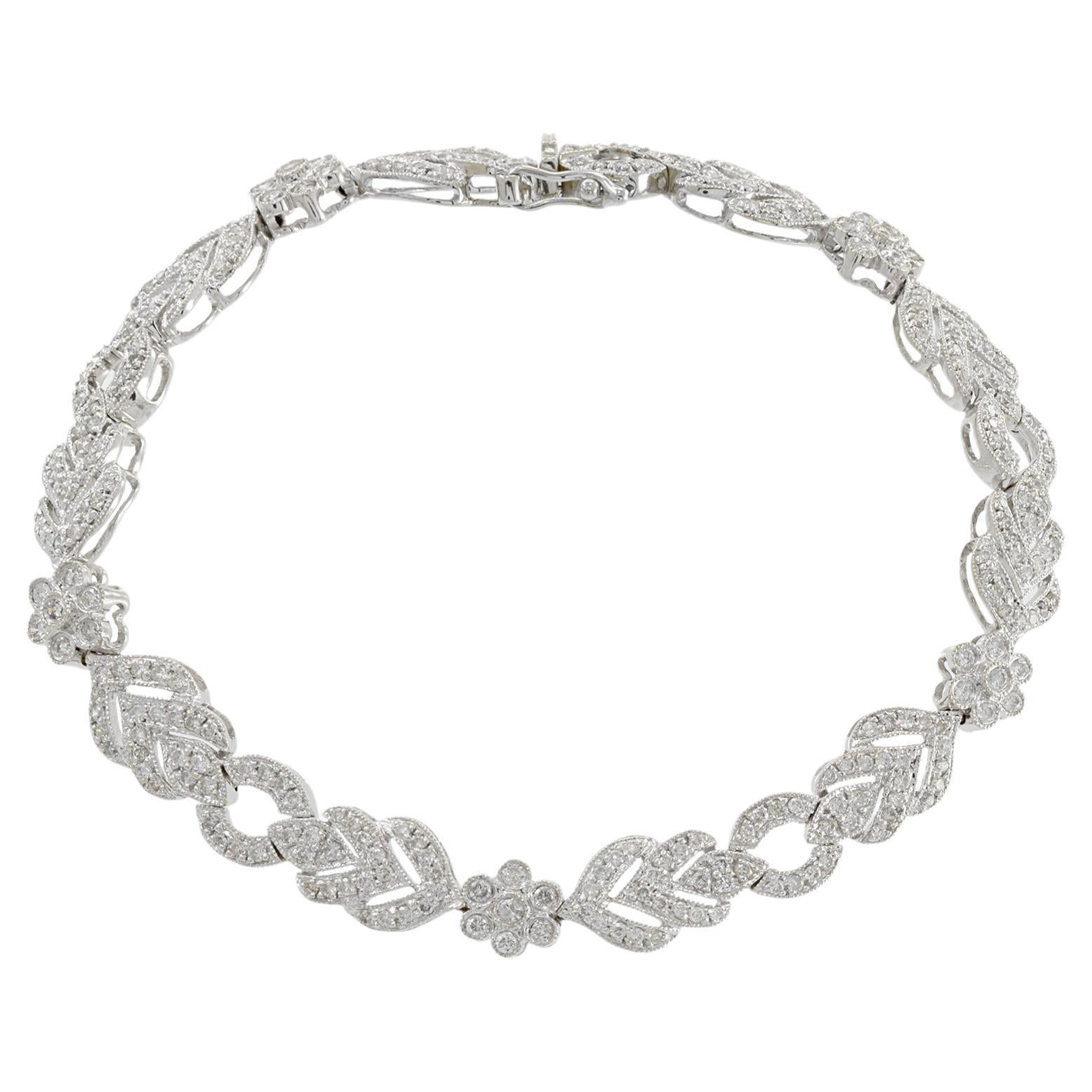 Estate 14KT White Gold Flower And Chevron Design Diamond Bracelet For Sale