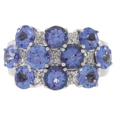 Anillo de oro blanco de 14 quilates con tanzanita y diamantes