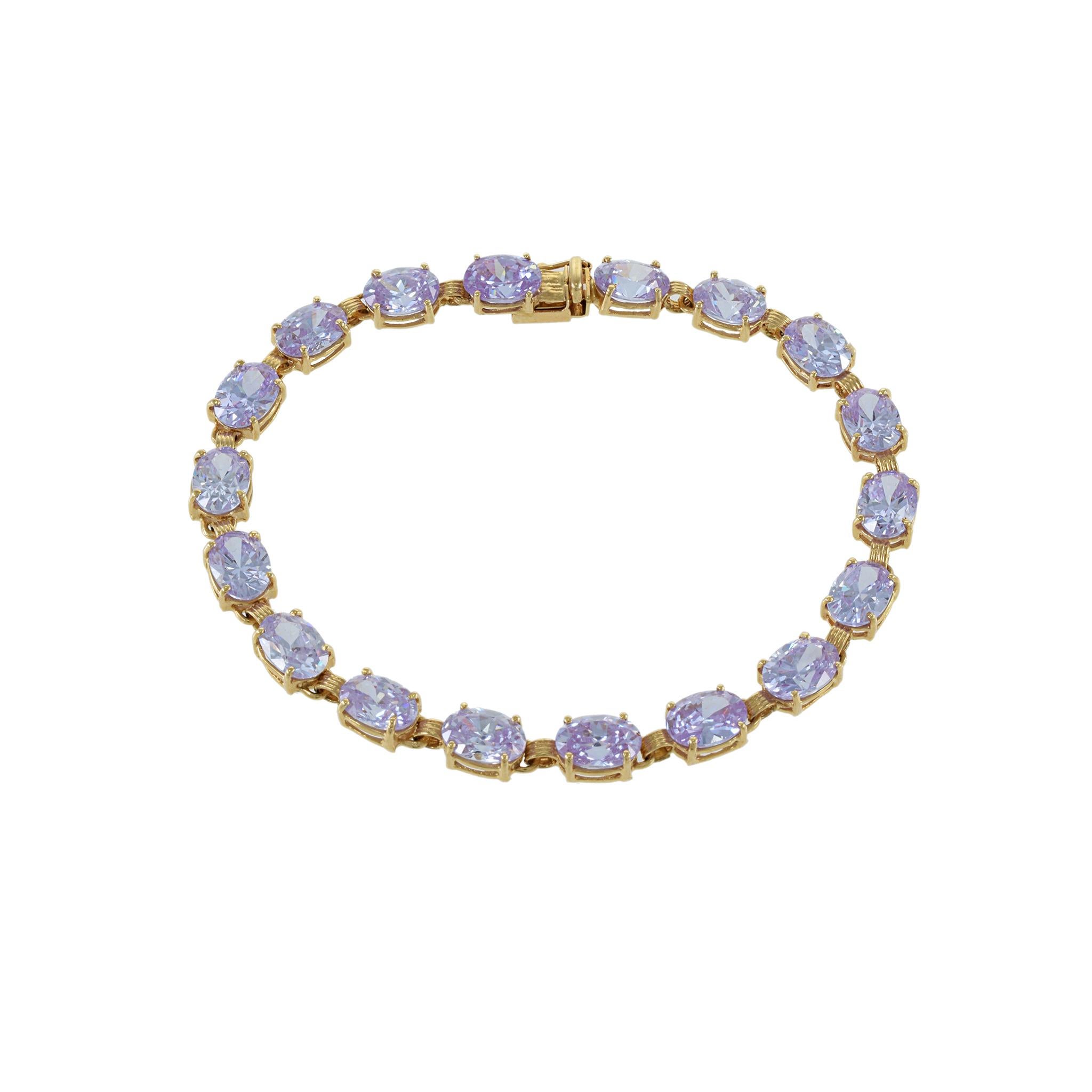 Crafted with high-quality 14KT yellow gold and featuring an elegant oval cut light purple cubic zirconia stone, this bracelet is a luxurious addition to any jewelry collection. Its exquisite design showcases the perfect balance of sophistication and