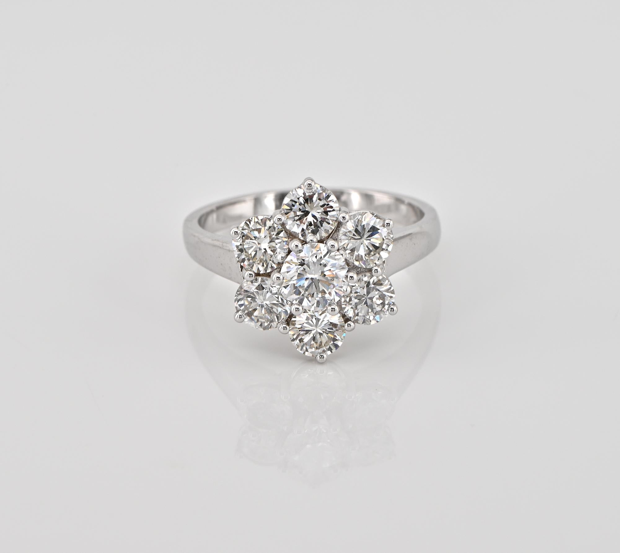 Fabulous Dazzler
This perfect estate Seven Diamond flower ring is suitable for any occasion
Hand crafted of solid 18 Kt gold, stamped
A classy cluster style shaped as a Daisy flower will be a statement for a lifetime
7 bright and glistening