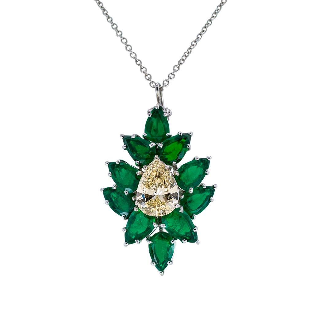 Estate 1.79 carats lite yellow color pear shaped diamond and pear shaped emerald and platinum enhancer pendant. *   Love it because it caught your eye, and we are here to connect you with beautiful and affordable jewelry.  It is time to claim a