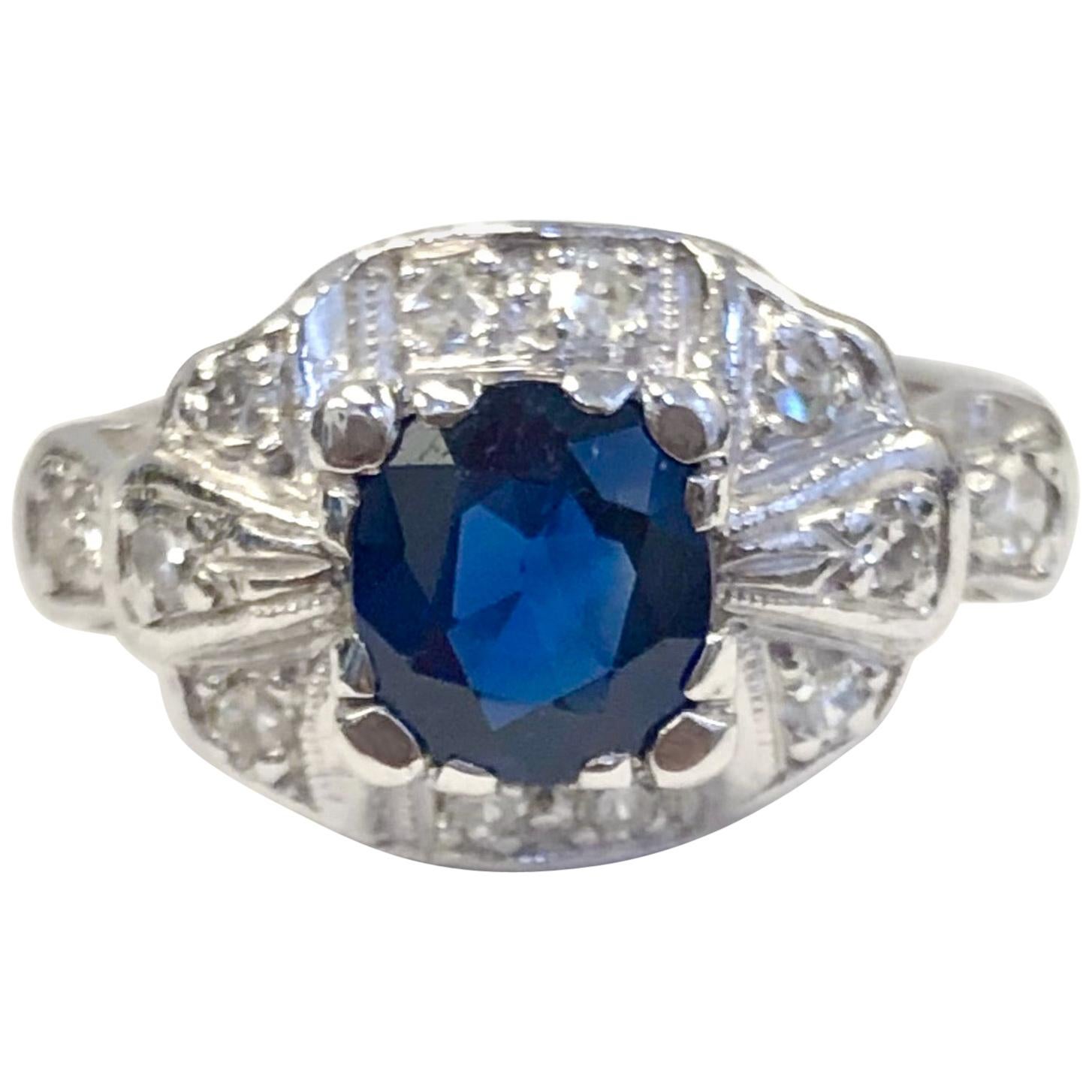 Estate 18 Karat Diamond and 1.30 Carat Burma Sapphire Ring with Finger Fit For Sale