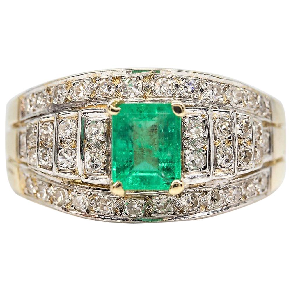 Estate 18 Karat Gold Emeralds and Diamonds Ring