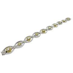 Estate 18 Karat Two-Tone Gold Radiant Cut Yellow Diamond Tennis Bracelet