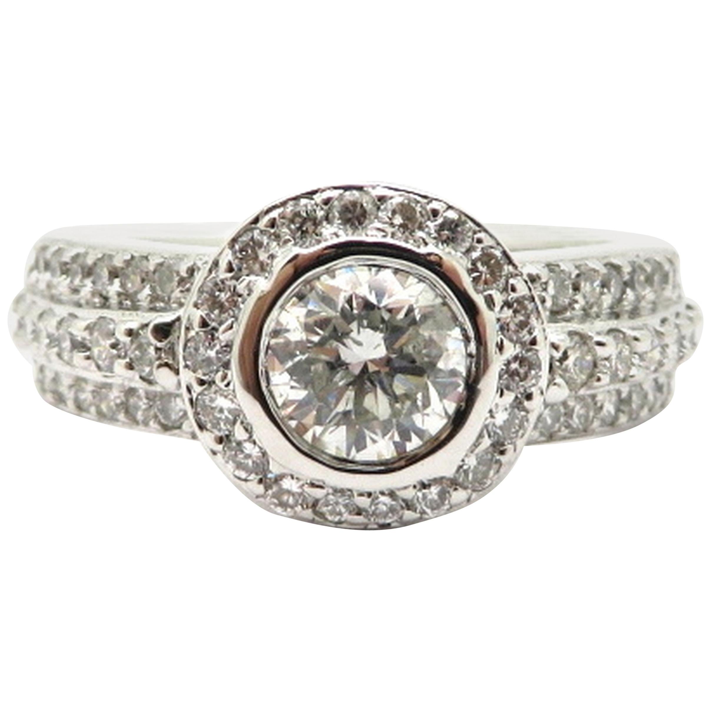 Estate 18 Karat White Gold Round Halo Pave Diamond Engagement Ring