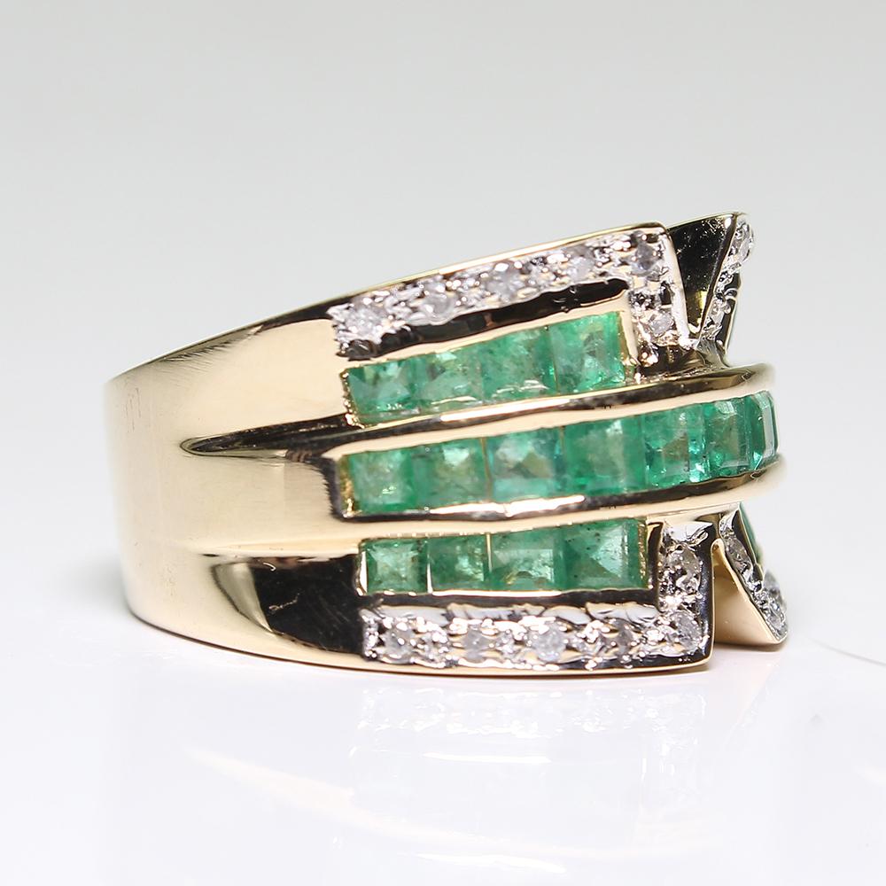 Period: Estate
Composition: 18K yellow gold.
Stones:
•	24 Full cut diamonds of J-SI1 quality that weigh 0.20ctw. 
•	31 natural square cut emerald that weigh 2ctw.
Ring size: 
Ring face:  
Rise above finger: 
Total weight:  grams. 
This purchase