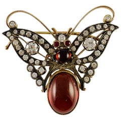 Vintage Estate 18 Karat Yellow Gold Diamond Garnet and Ruby Butterfly Brooch Pin