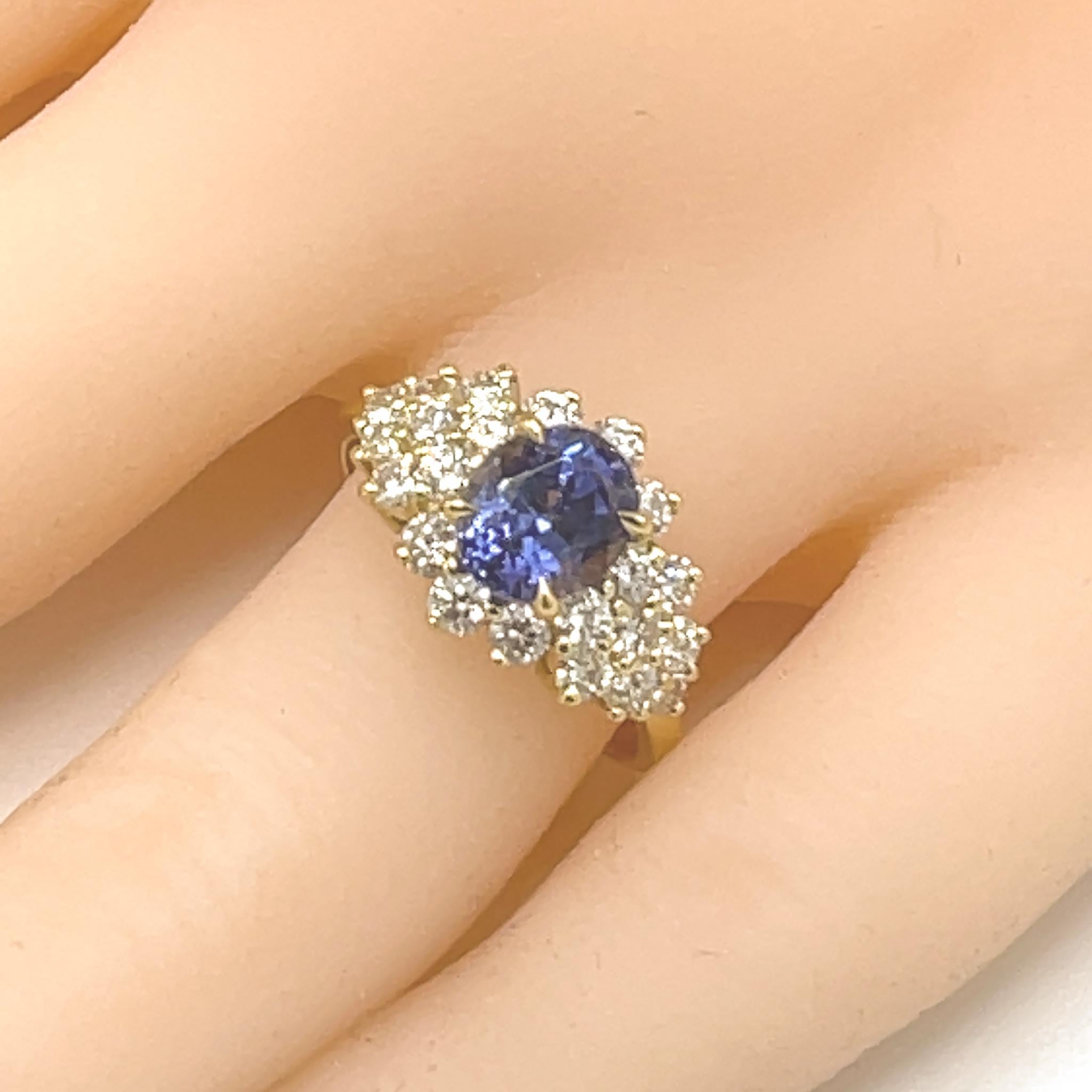 18 kt Yellow Gold
Tanzanite: 2.09 tcw (estimated)
Diamond: 1.05 ct twd (estimated)
Ring Size: 7.5
Total Weight: 5.12 grams