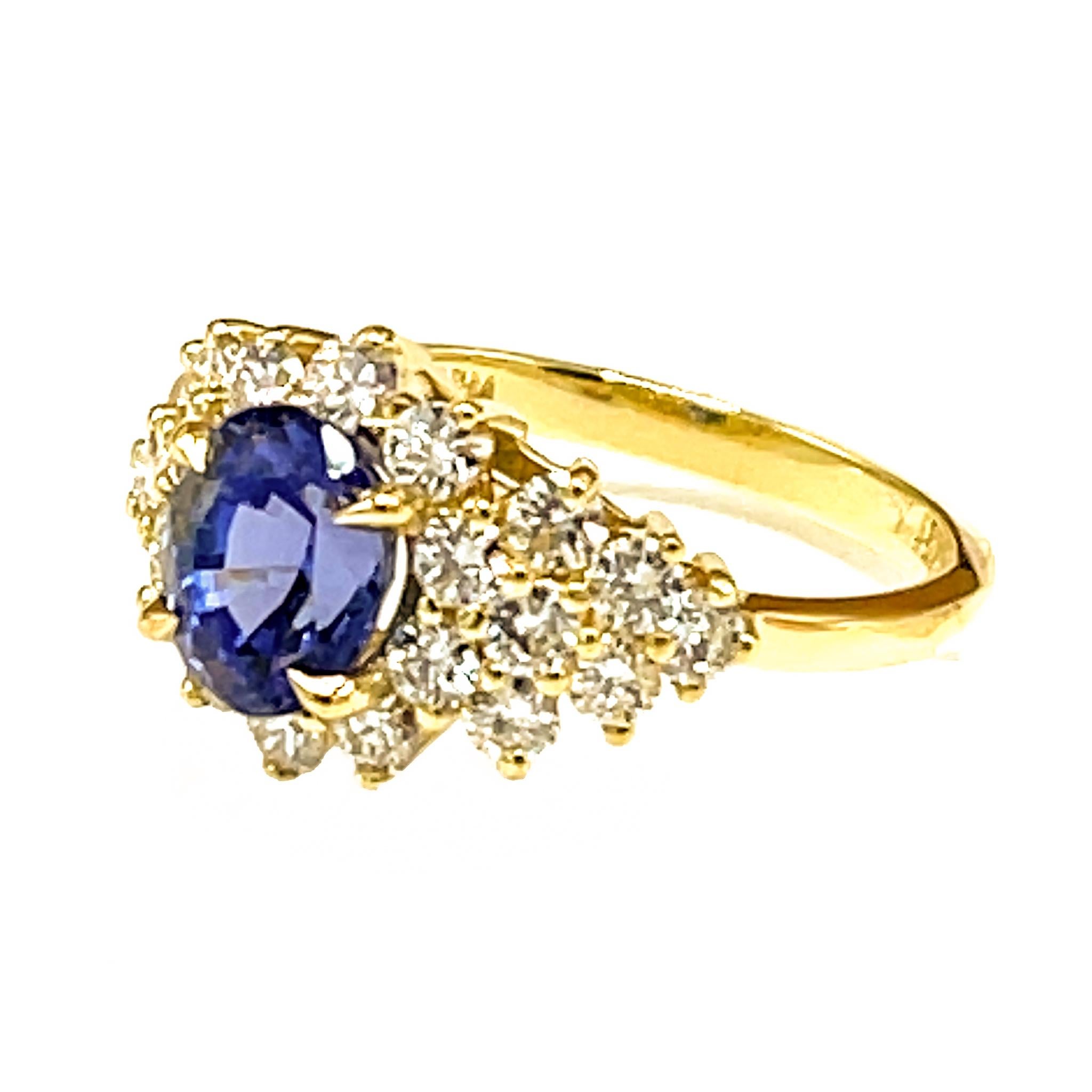 Oval Cut Estate 18 kt Yellow Gold Tanzanite and Diamond Ring For Sale