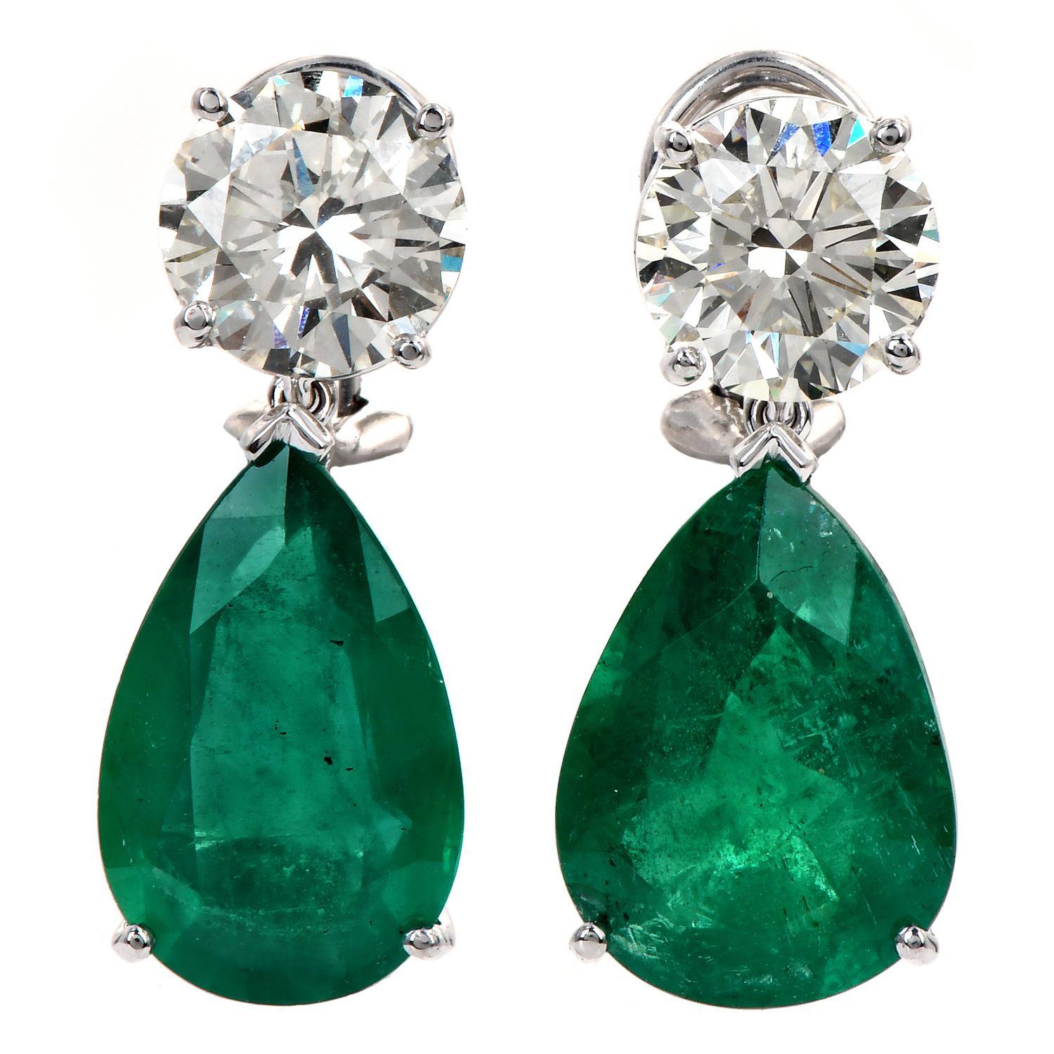 These exquisite earrings are truly a sight to behold.

Crafted in solid 18K White Gold.

They feature a clip-on closure with posts in a dangle drop style, allowing the radiating Genuine Emeralds to gracefully sway with every movement, catching the