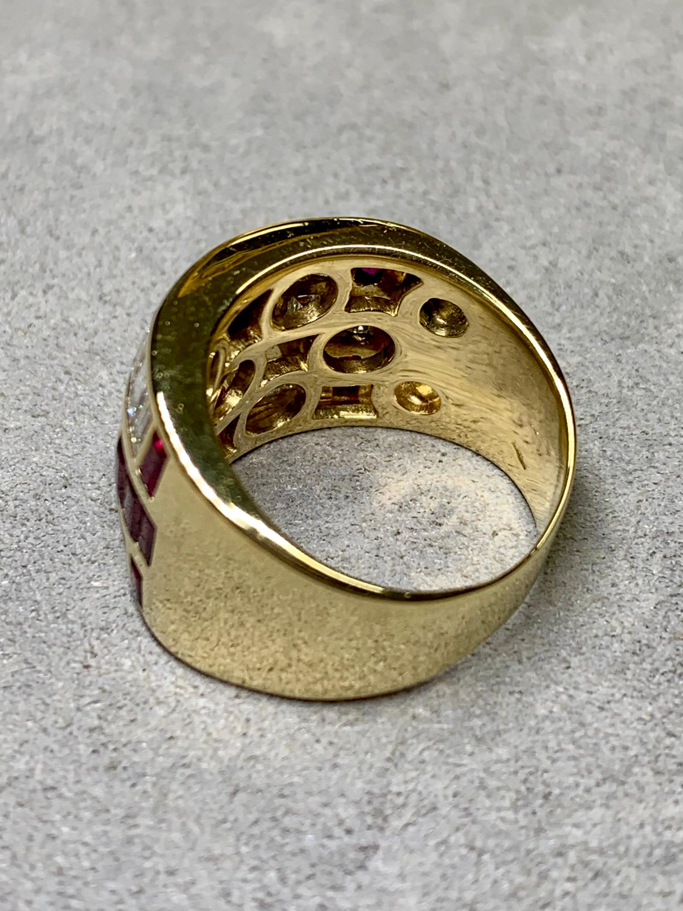 
A substantial Italian made cocktail ring crafted in 18K yellow gold and channel set with approximately 2.70ctw in large baguette cut diamonds averaging G-I in color and Vs1-2 in clarity. There is also another approximately 2ctw in clean, vibrant