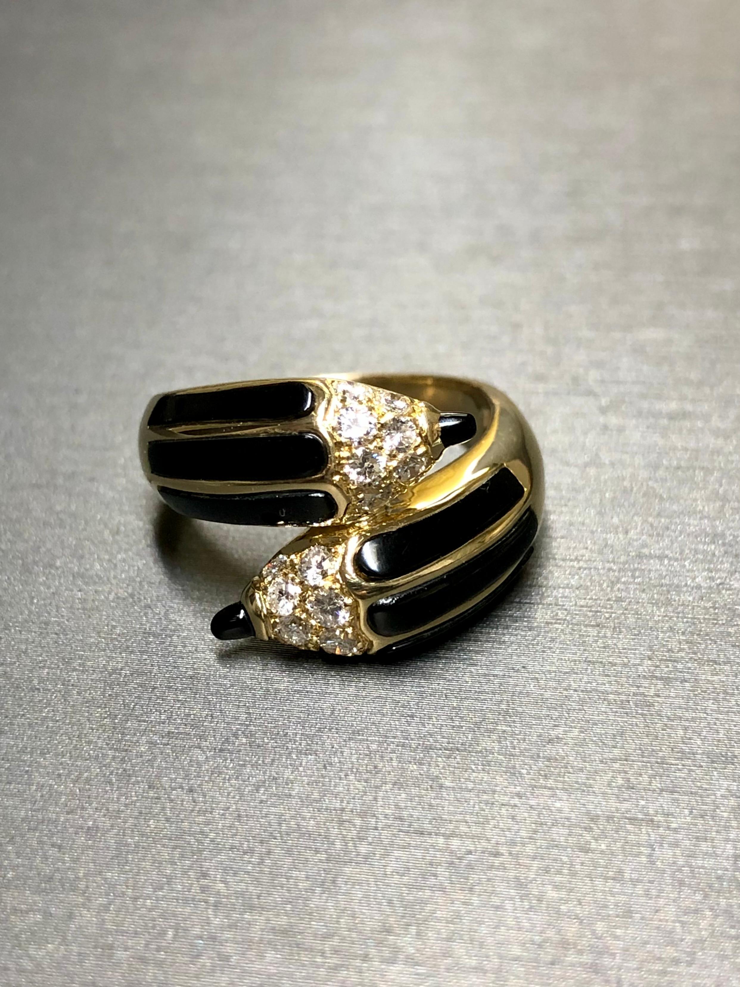 A whimsical estate ring done in 18K yellow gold and flawless black enamel. The tips of each pencil are prong set with perfectly matched G color VS clarity round diamonds. The design and execution are just gorgeous. This is quite the original piece