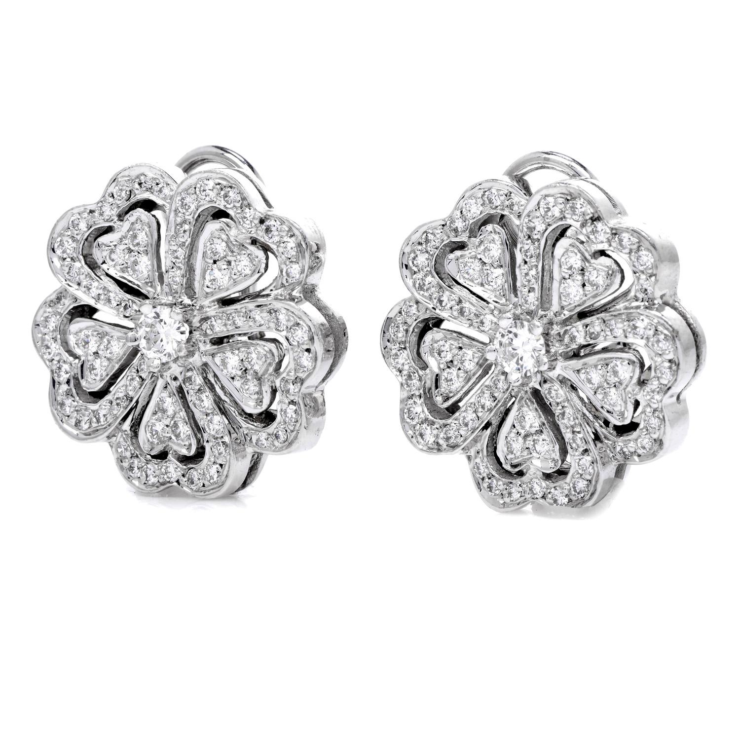 With a Ferris Wheel-inspired design these Vintage earrings were carefully crafted in platinum

Their two Center round cut diamonds weigh approx. 0.38 carat in total, G-H Color, VS1 Clarity Diamonds bring the sparkle and the love sensation towards