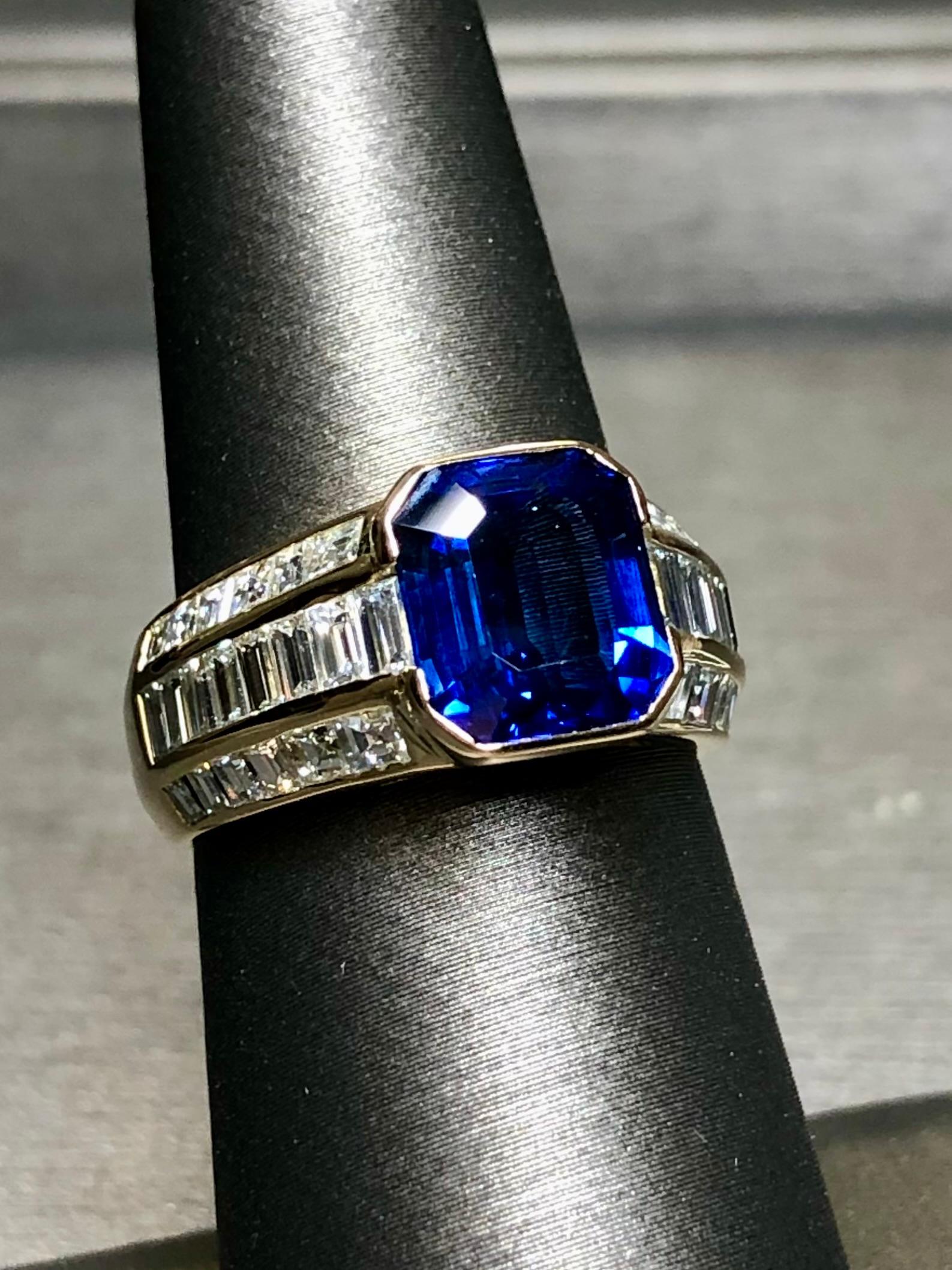 
A brilliant ring holding a brilliant stone. This ring is done in 18K yellow gold holding and approximately 3.90ct emerald cut sapphire exhibiting beautiful color and completely loupe clean of inclusions. The ring itself has been channel set with