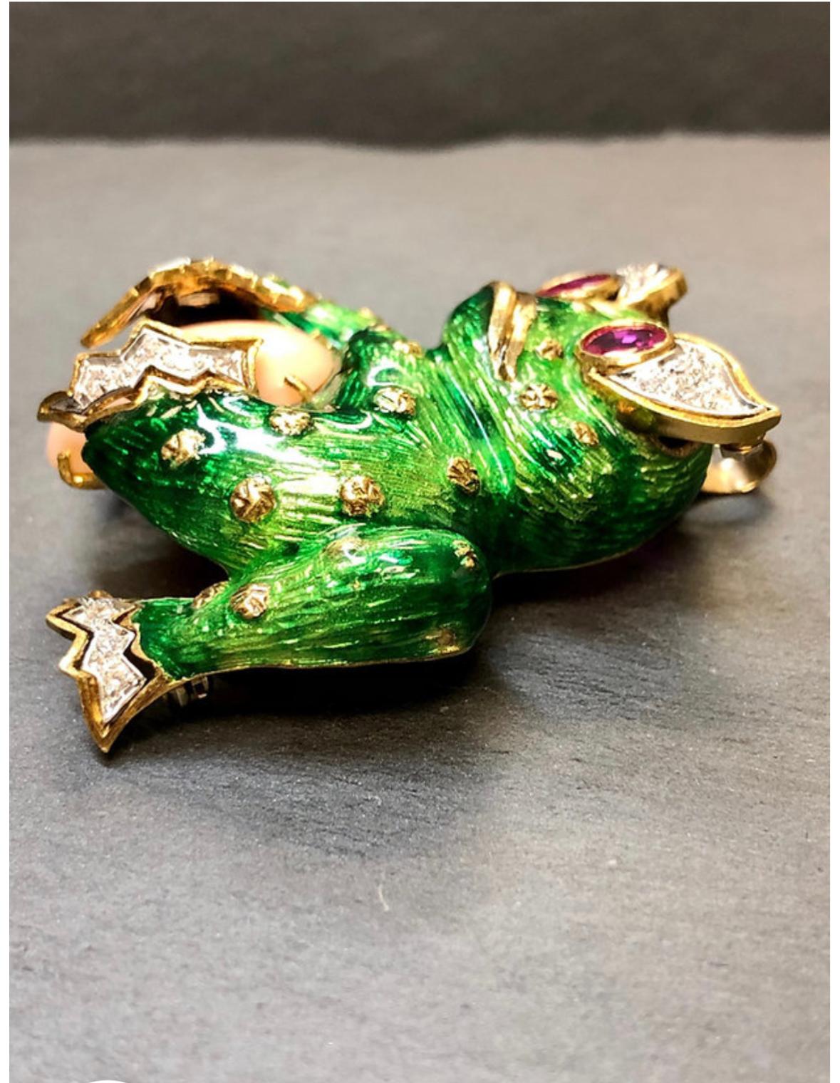 A whimsical designer inspired pendant converted from what was once a brooch. It has been crafted in 18K yellow gold and layered in beautiful green enamel and set with approximately .50cttw in G-H color Vs clarity round diamonds as well as 1.50cttw