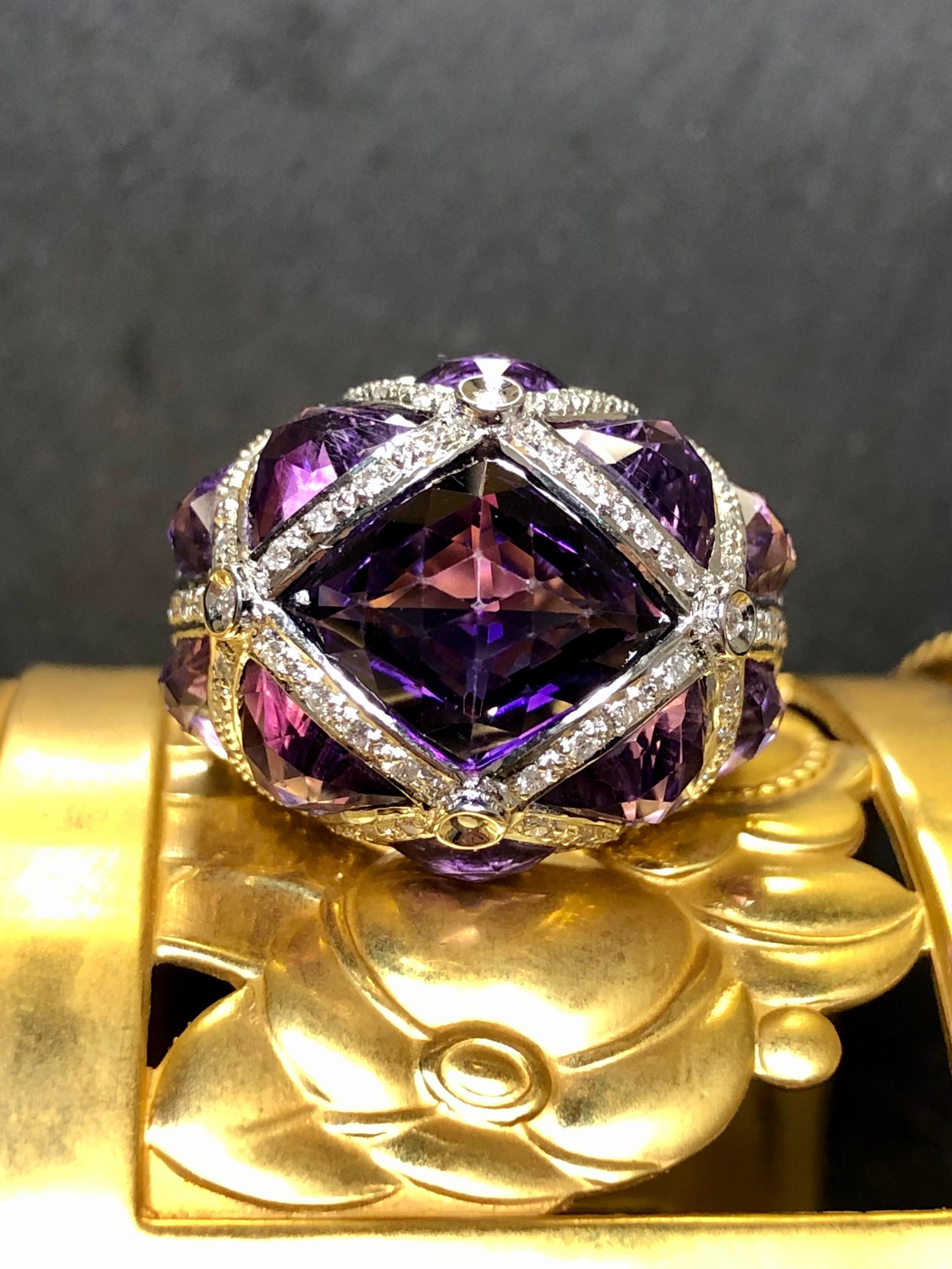 A fabulous cocktail ring done in 18K white gold set with 12.34cttw in fancy cut natural amethyst and .53cttw in G-I color Vs1-2 clarity round diamonds.


Dimensions/Weight:

Rings measures .75” tall and is a size 7. Ring weighs