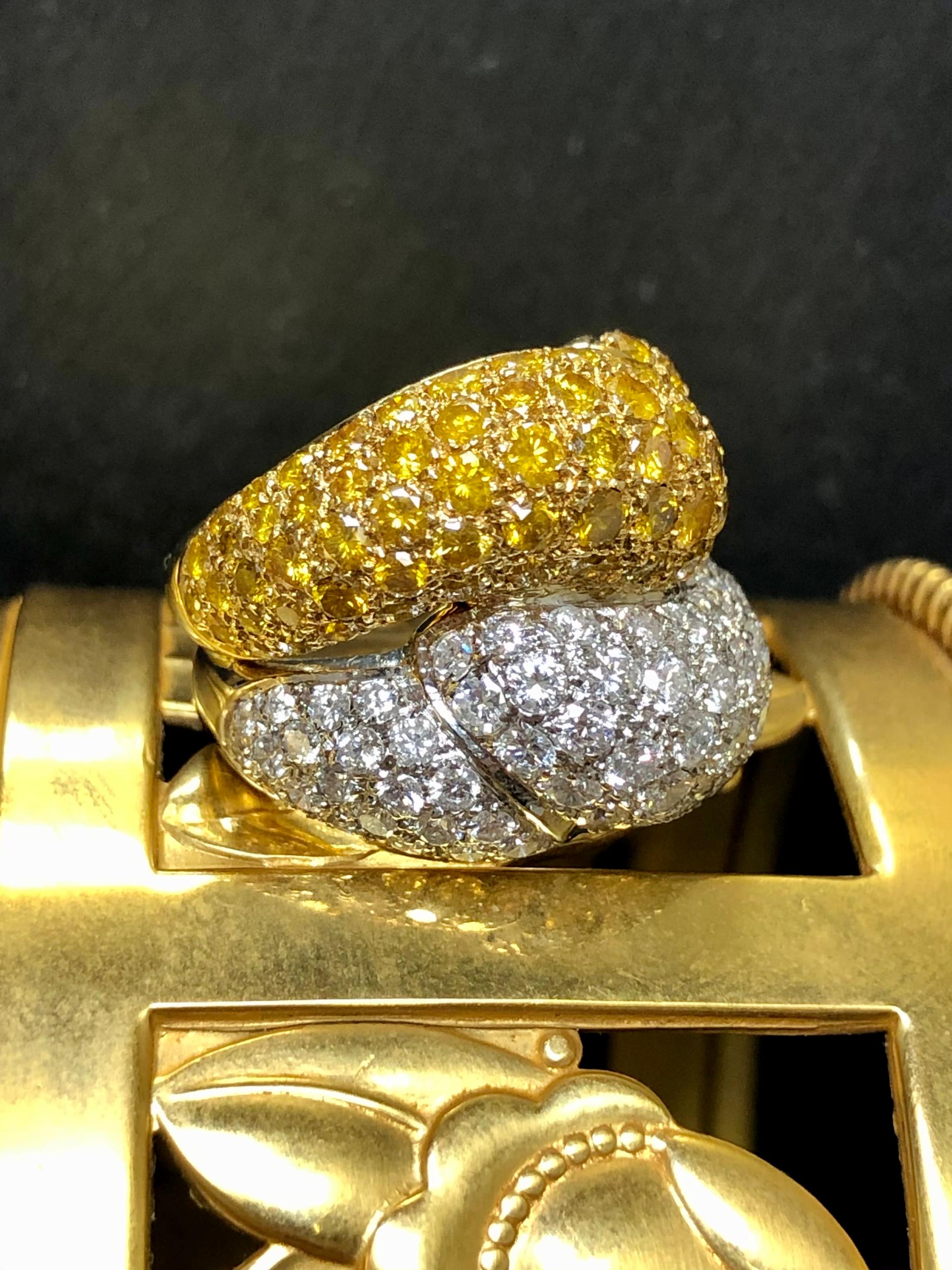That’s absolutely gorgeous ring screams quality from front to back down to the azuring of the diamonds. It has been hand made in 18K yellow and white gold and set with approximately 3.15cttw in G-H color Vs1-2 clarity white diamonds as well as