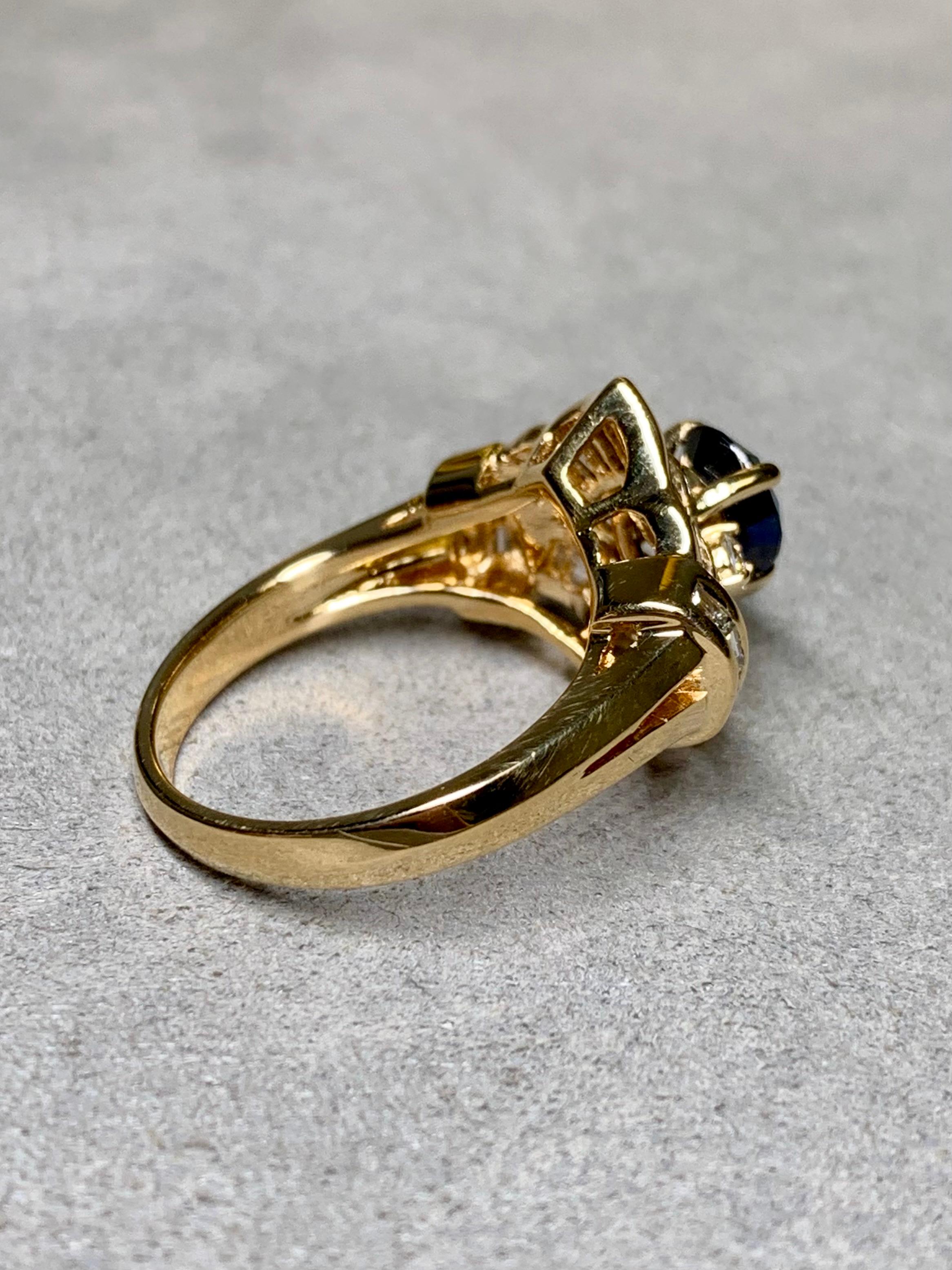 
A lovely cocktail ring crafted in 18K yellow gold and centered by a 1.41ct pear shape natural sapphire surrounded by approximately 1.80ctw in H-I color Vs1-2 clarity round and baguette diamonds.


Dimensions/Weight:

This ring measures .60” top to