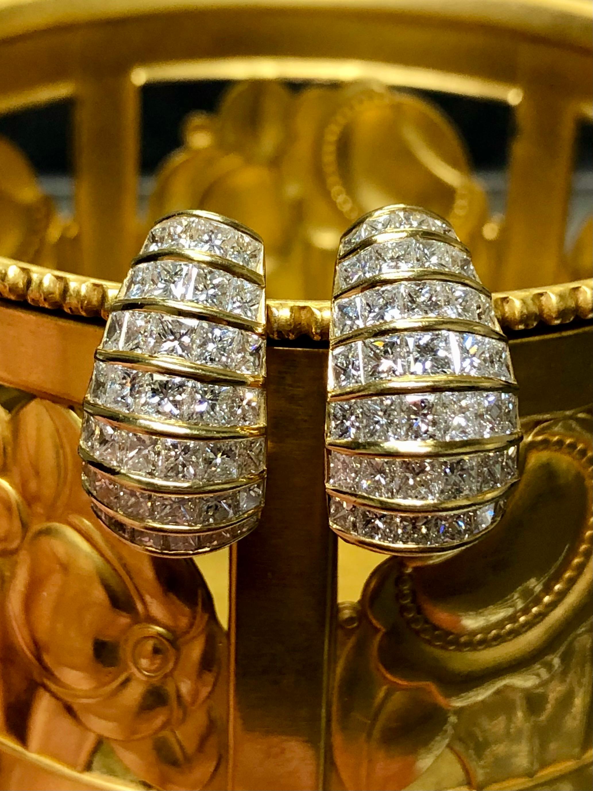 
An impressive pair of Huggies done in 18K yellow gold and set with approximately 7cttw in F-G vs1-2 clarity pricess cut diamonds. The setting is absolutely perfect with no gaps and all stones are perfectly matched. The pictures simply do no do them