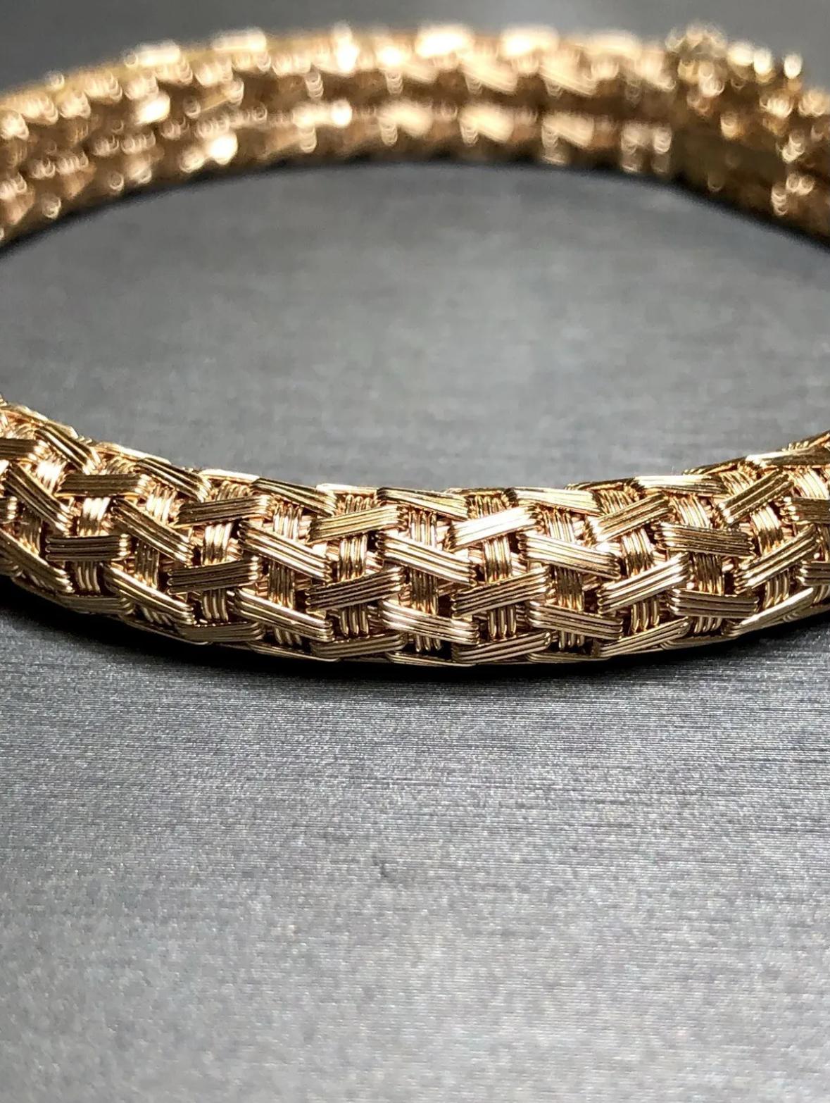 
A finely made bracelet crafted in heavy 18K rose gold in a gorgeous, detailed weave design. Complete with box clasp and safety.


Dimensions/Weight:

Bracelet measures 7” long and .43” wide and weighs 37.6g.


Condition:

Bracelet is free of any