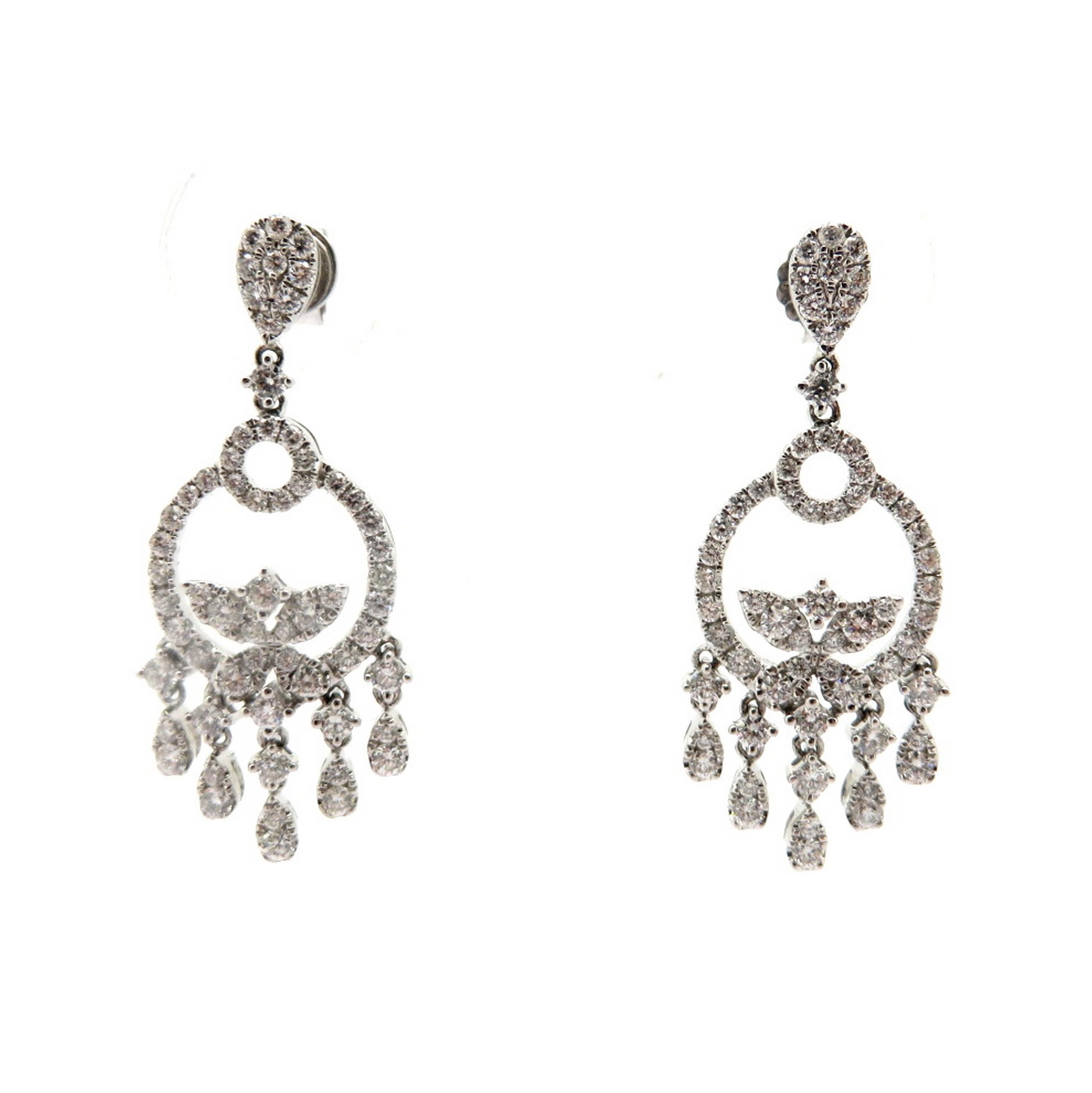 Estate 18K white gold 2.10 carat round diamond dangle chandelier earrings. Showcasing 124 round brilliant cut bead and prong set diamonds weighing a combined total of approximately 2.10 carats. Diamond grading: color grade: G. Clarity grade: VS1.