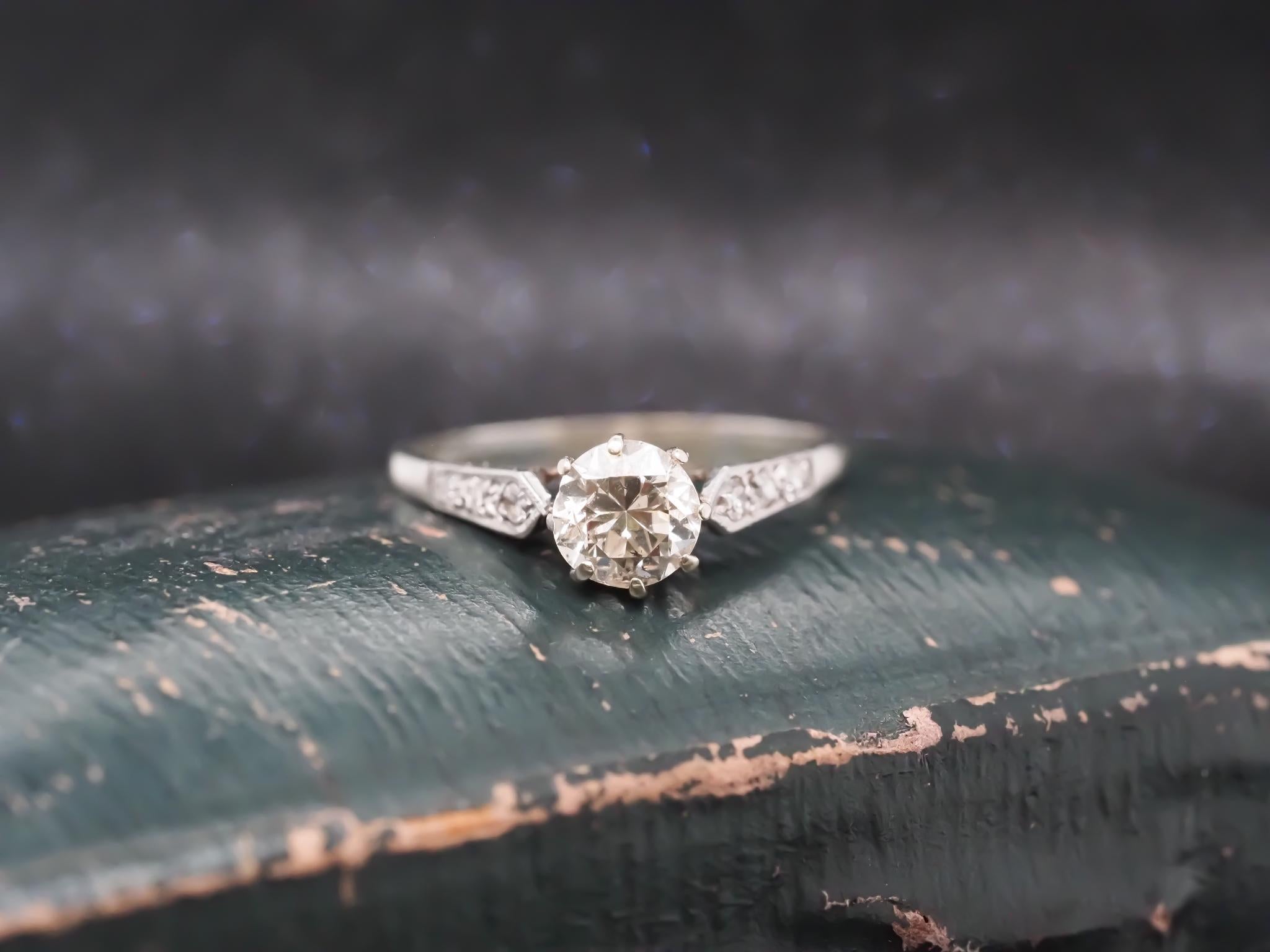 Estate 18K White Gold .80ct Old European Diamond Engagement Ring - VHK#268a

Year: 1910s

Item Details:
Ring Size: 6.5 (Sizable)
Metal Type: 18K White Gold [Hallmarked, and Tested]
Weight: 1.9 grams

Diamond Details: .80ct, Old European Brilliant, L