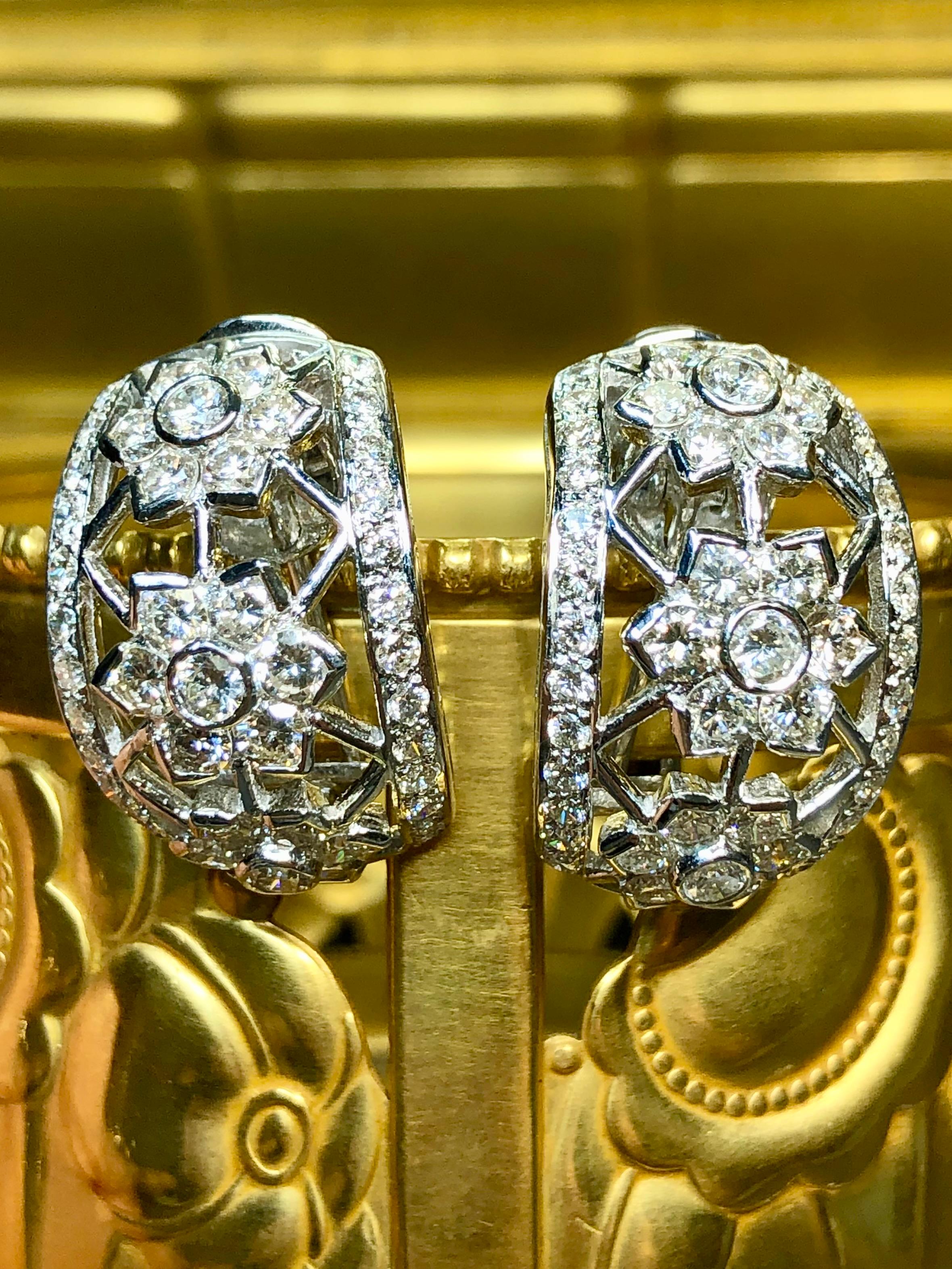 Contemporary Estate 18K White Gold Diamond Openwork Floral Shrimp Huggie Earrings 4.65ctw For Sale