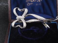 Estate 18K White Gold Long Ribbon Diamond Brooch