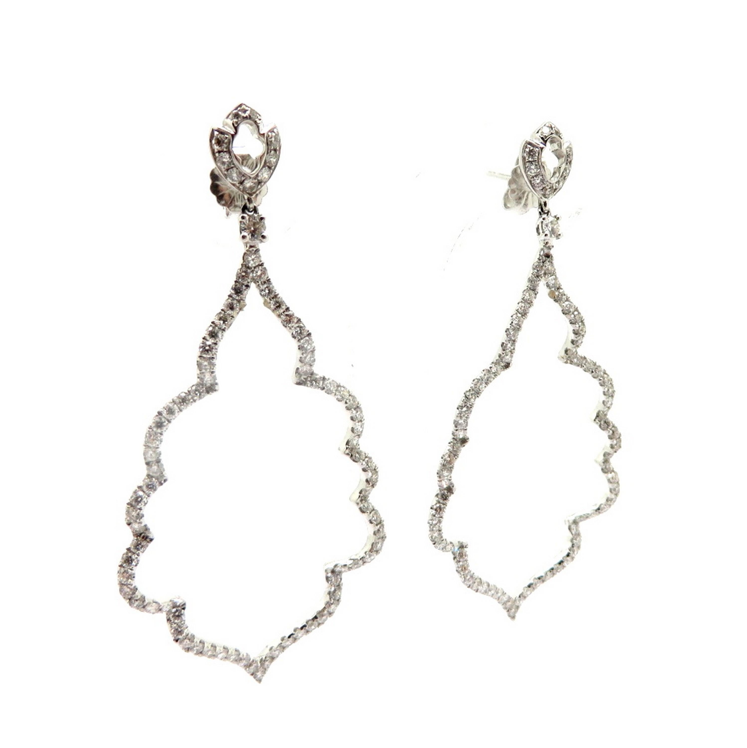 Estate 18K white gold round diamond dangle fashion statement earrings. Showcasing 135 round brilliant cut bead set diamonds weighing a combined total of approximately 1.32 carats. Diamond grading: color grade: G – H. Clarity grade: VS1. The earrings