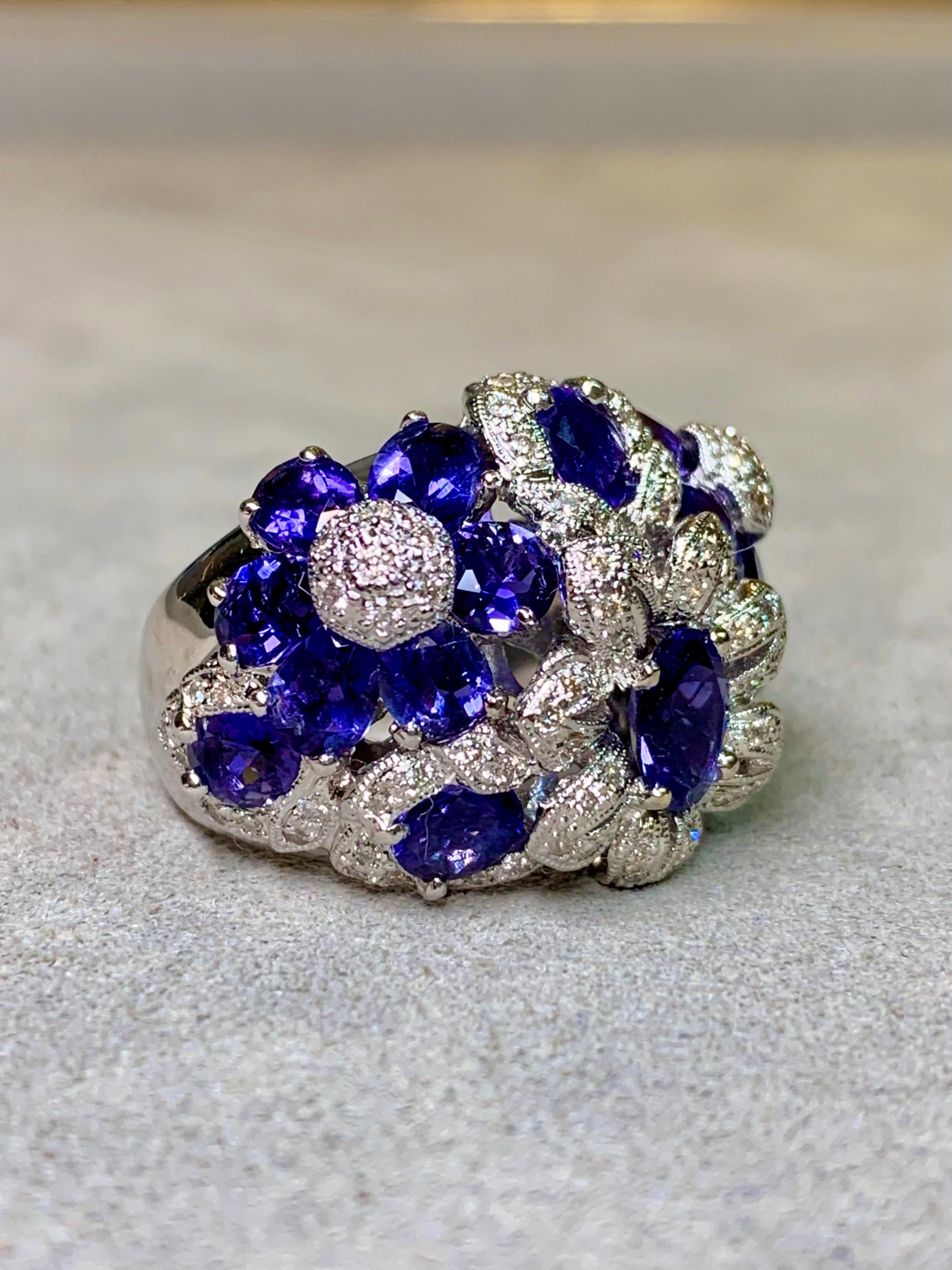 Contemporary Estate 18K White Gold Tanzanite Diamond Floral Bombe Style Cocktail Ring 6.95ctw For Sale