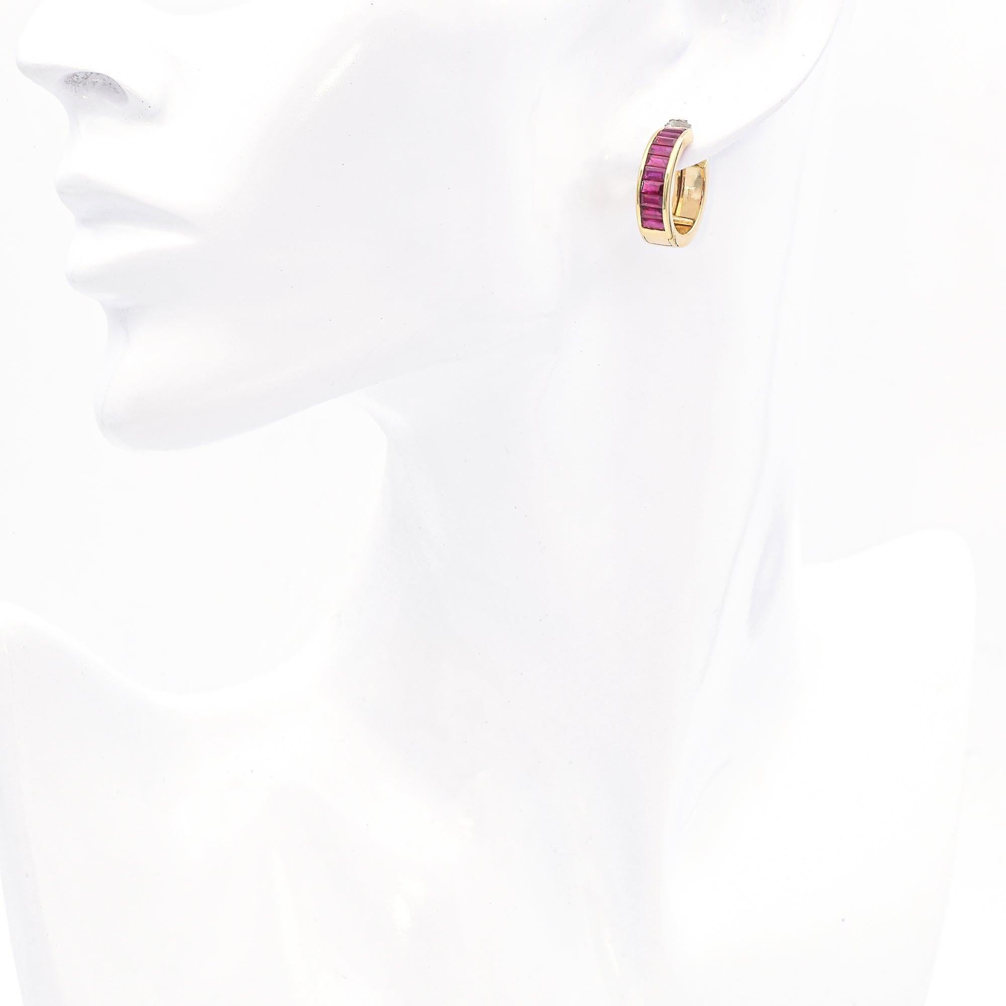 Weight: 7.7 Grams
Stone: Ruby Baguette (4x2.1mm) 2.4 TCW
Measurements: 18.2mm diameter x 2.4mm
Hallmark: 750

Item #: BR-1321-061424-17