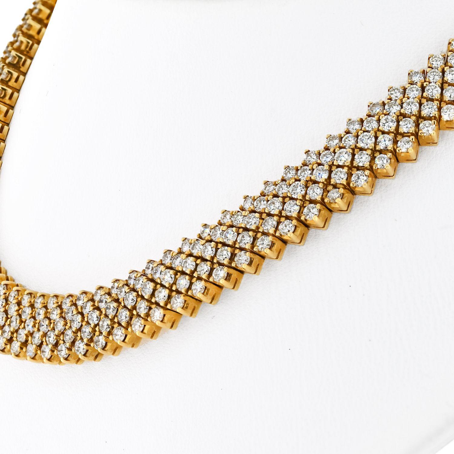 The Estate 18K Yellow Gold 29 Carat Diamond Carpet Multi-Row Necklace is a truly remarkable piece of jewelry that radiates opulence and sophistication. Crafted with the finest materials and exquisite craftsmanship, this necklace is a testament to