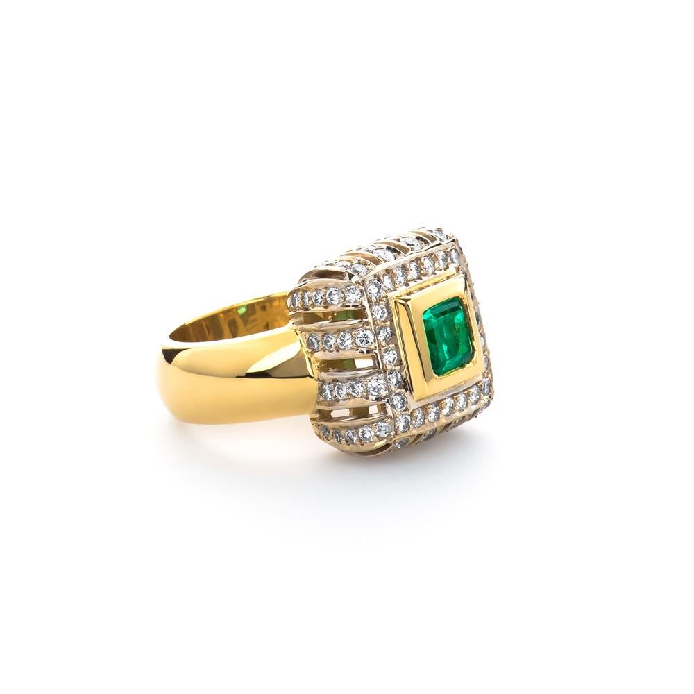 Estate 18K Yellow Gold 3.00 CTW Colombian Emerald & Diamond Cocktail Ring 15 Grams

One Fine Quality Princess Cut Natural Colombian Emerald, Weighing Approximately 
1.00 Carat Total Weight.
Color Grade: Vivid Green
Treatment: Oil Only

There Are 88