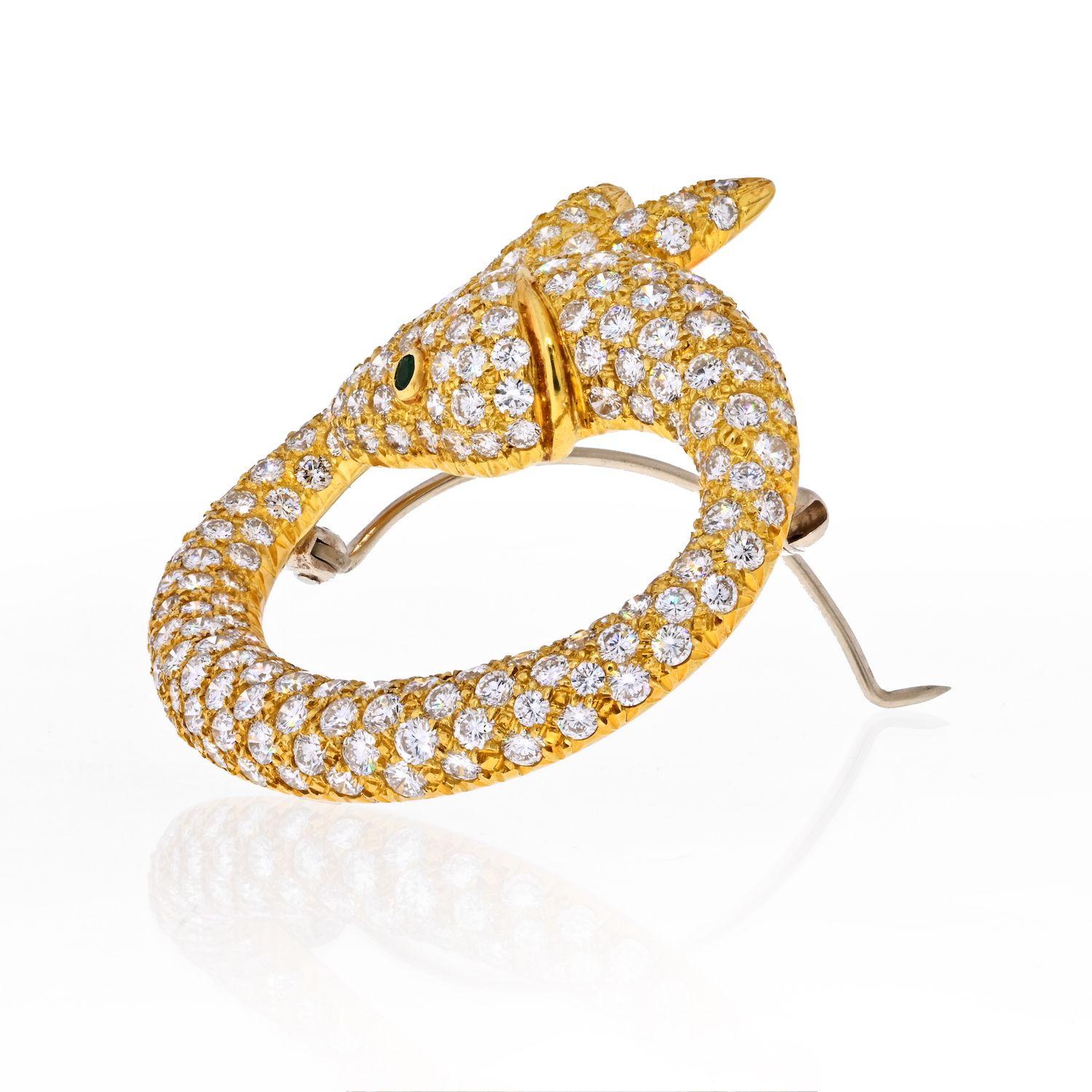 If you are into wearable art then this is the brooch for you. Made in 18K Yellow Gold this brooch is fashioned as a diamond Koi Fish with emerald eye. Brilliant brooch is made with quality round brilliant cut diamonds, with minimal material showing