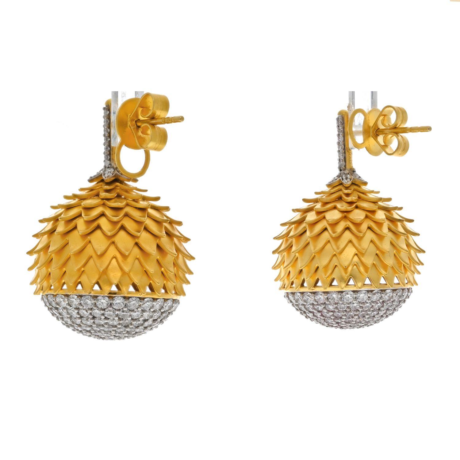 Refined diamond and 18K yellow gold earrings. Resembling acorns, they are adorned with high grade round brilliant cut diamonds. Featuring a very detailed satin finish gold setting. 
Earrings measure in length: 30mm
And 21 mm at the widest point.